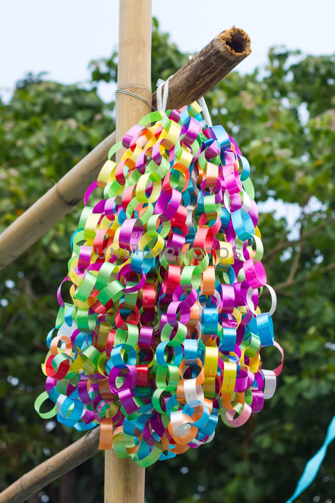 rolled colorful ribbon used for decorating place for worship in Thailand