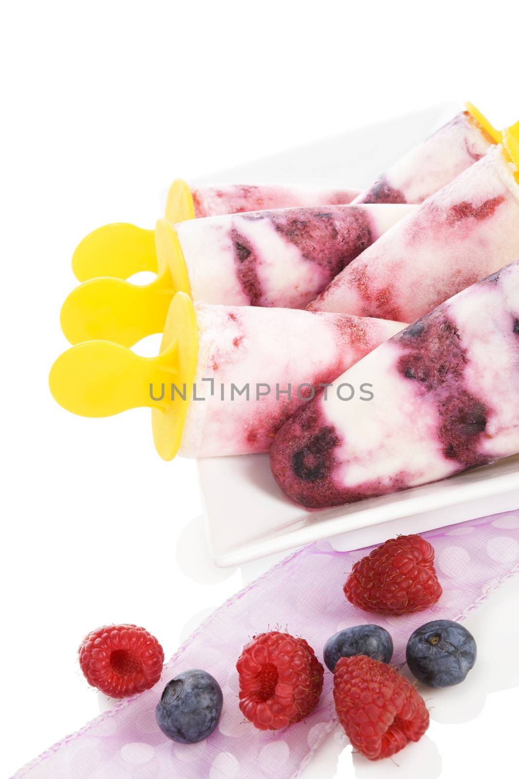 Fruit ice lolly with fresh fruit isolated on white background. by eskymaks