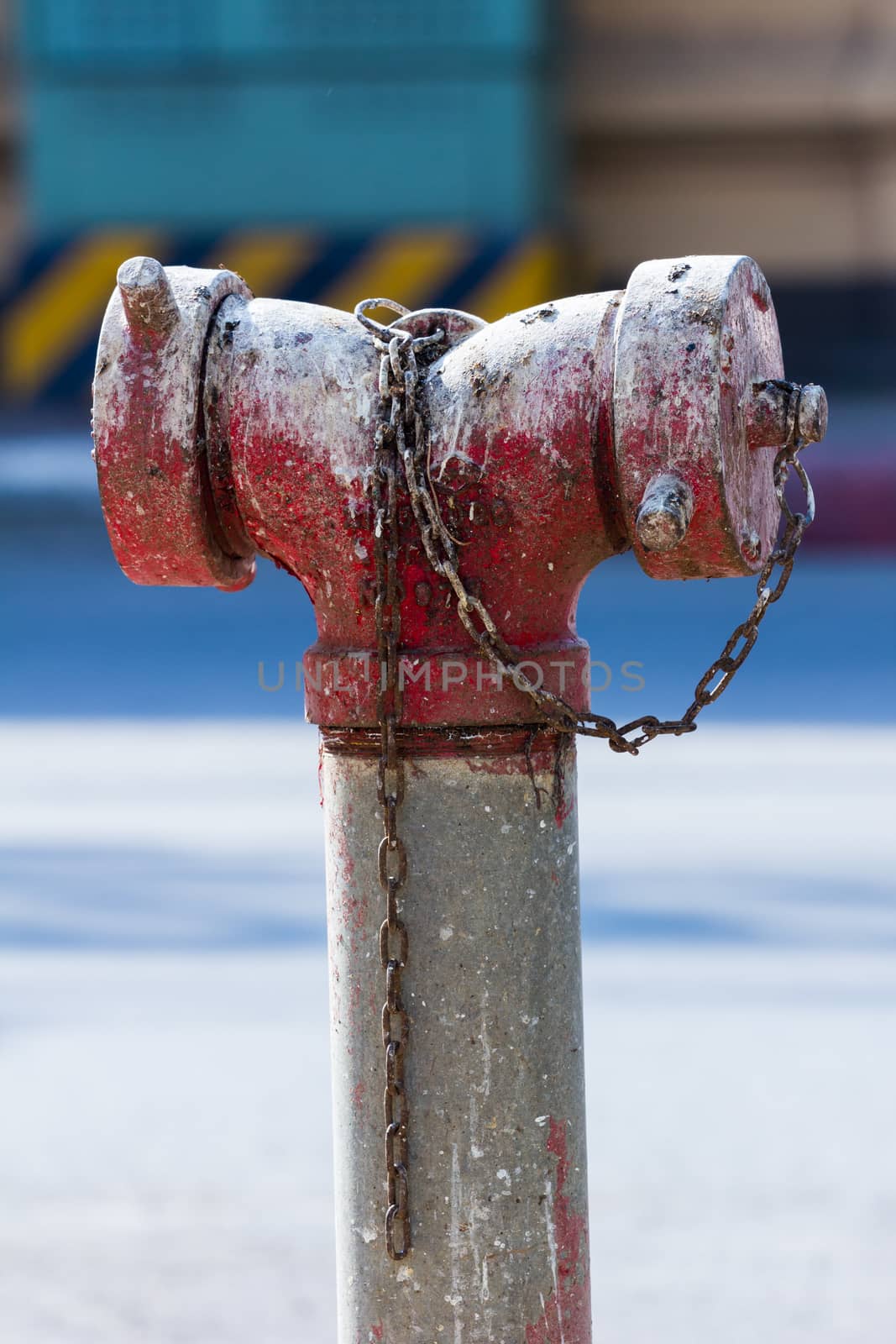 old red fire hydrant with bird shit in Thailand