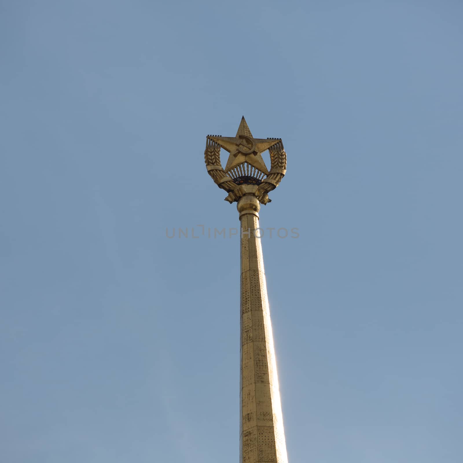 The top of high-rise building. Ussr symbol. Star.