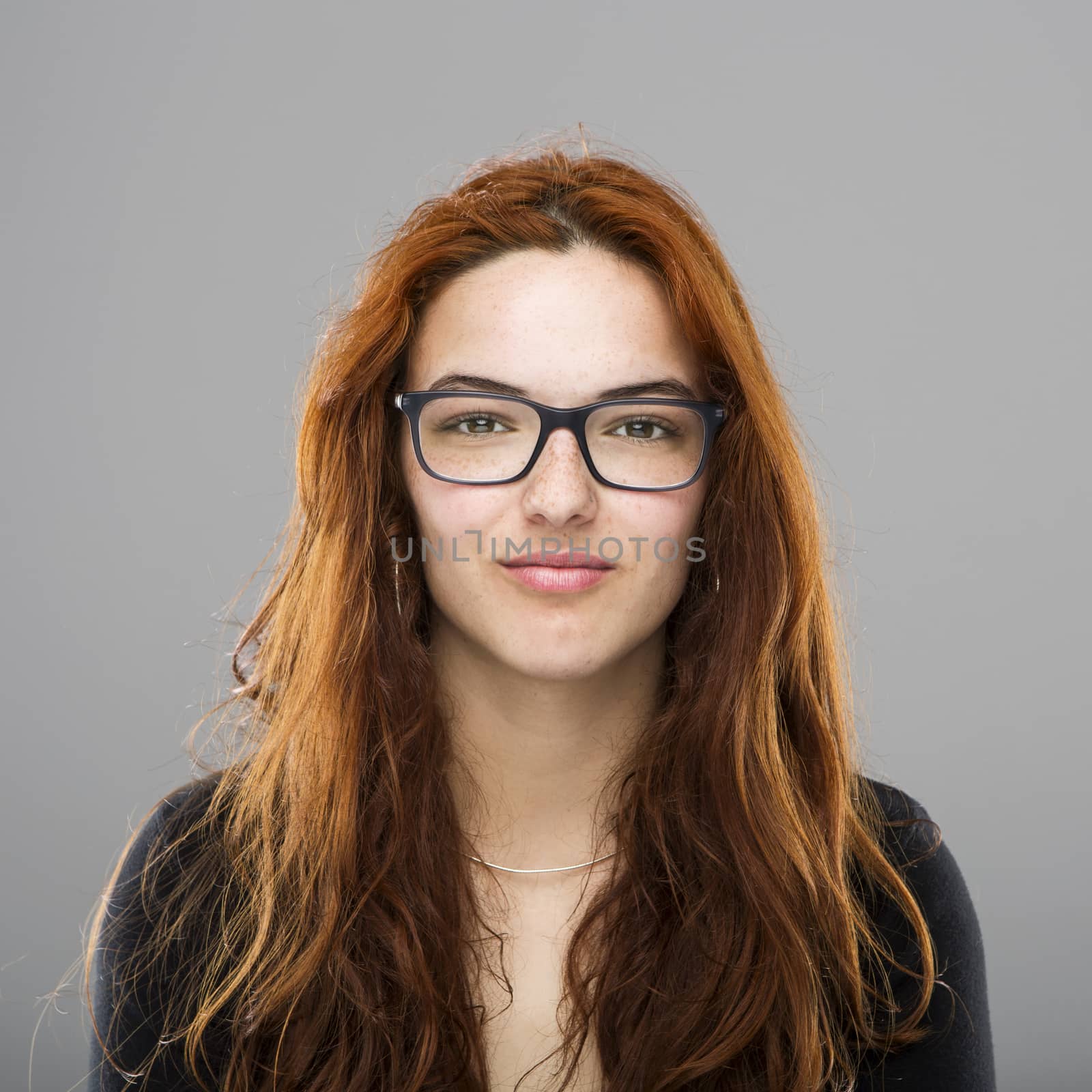 Portrait of beautiful hypster woman with red hair 