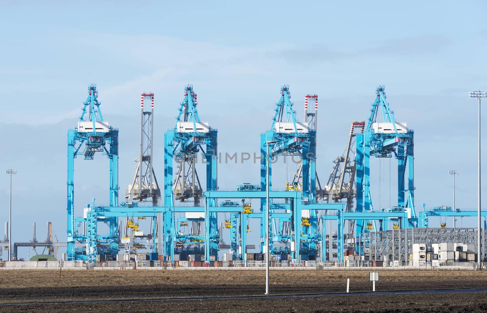 new industrial cranes in the europoort by compuinfoto
