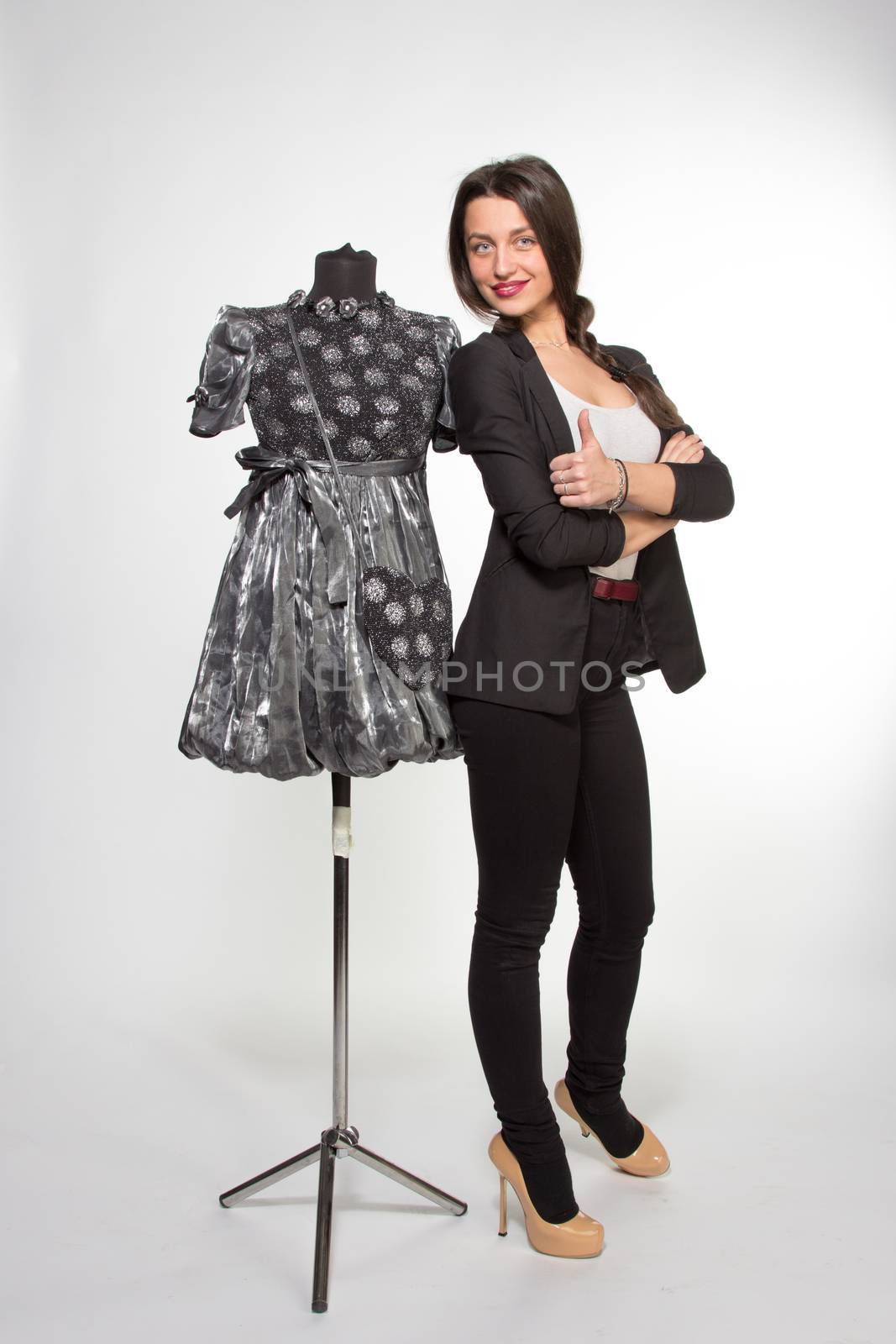 Woman with dressed mannequin