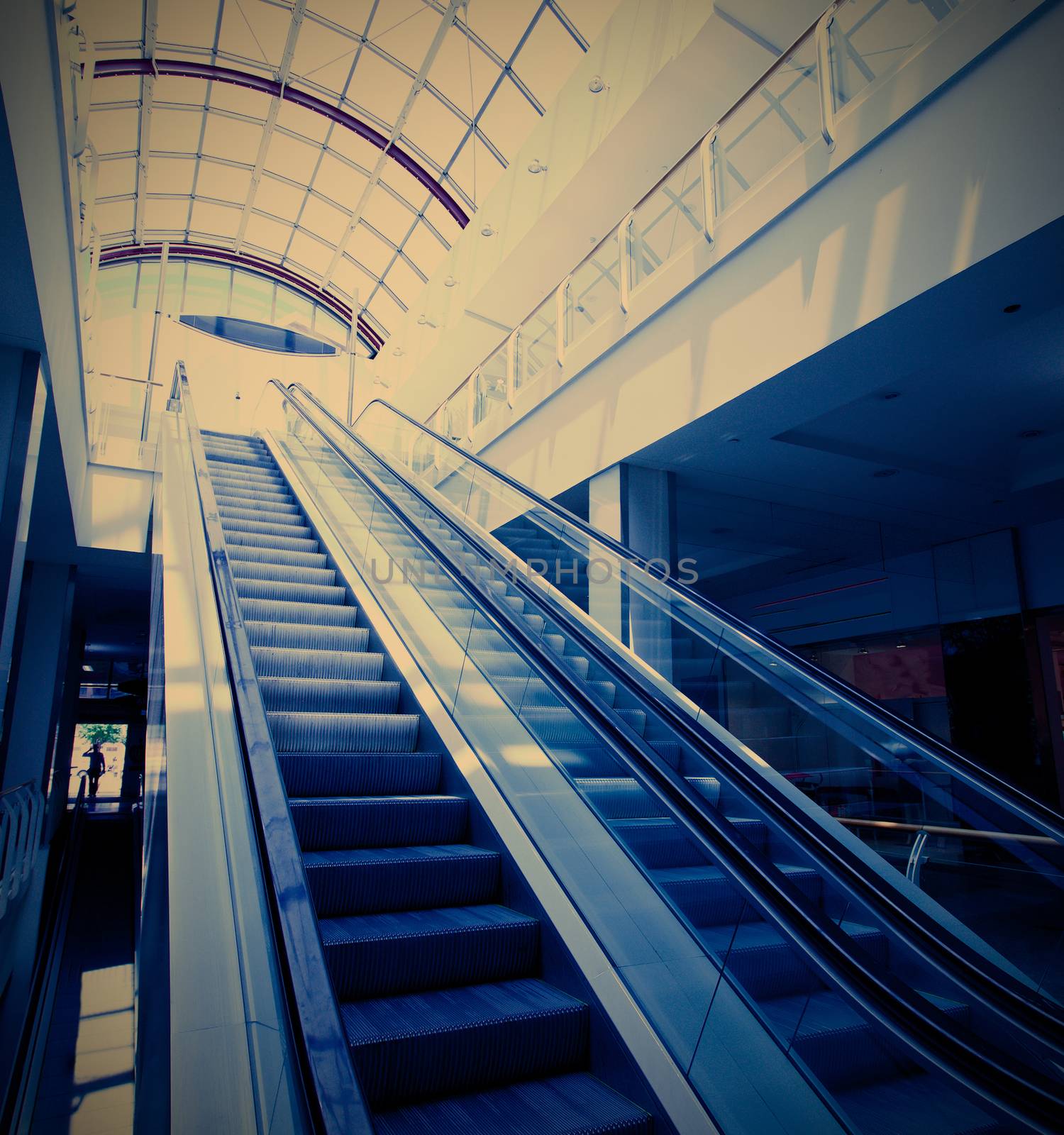 Escalator in modern building, instagram image style