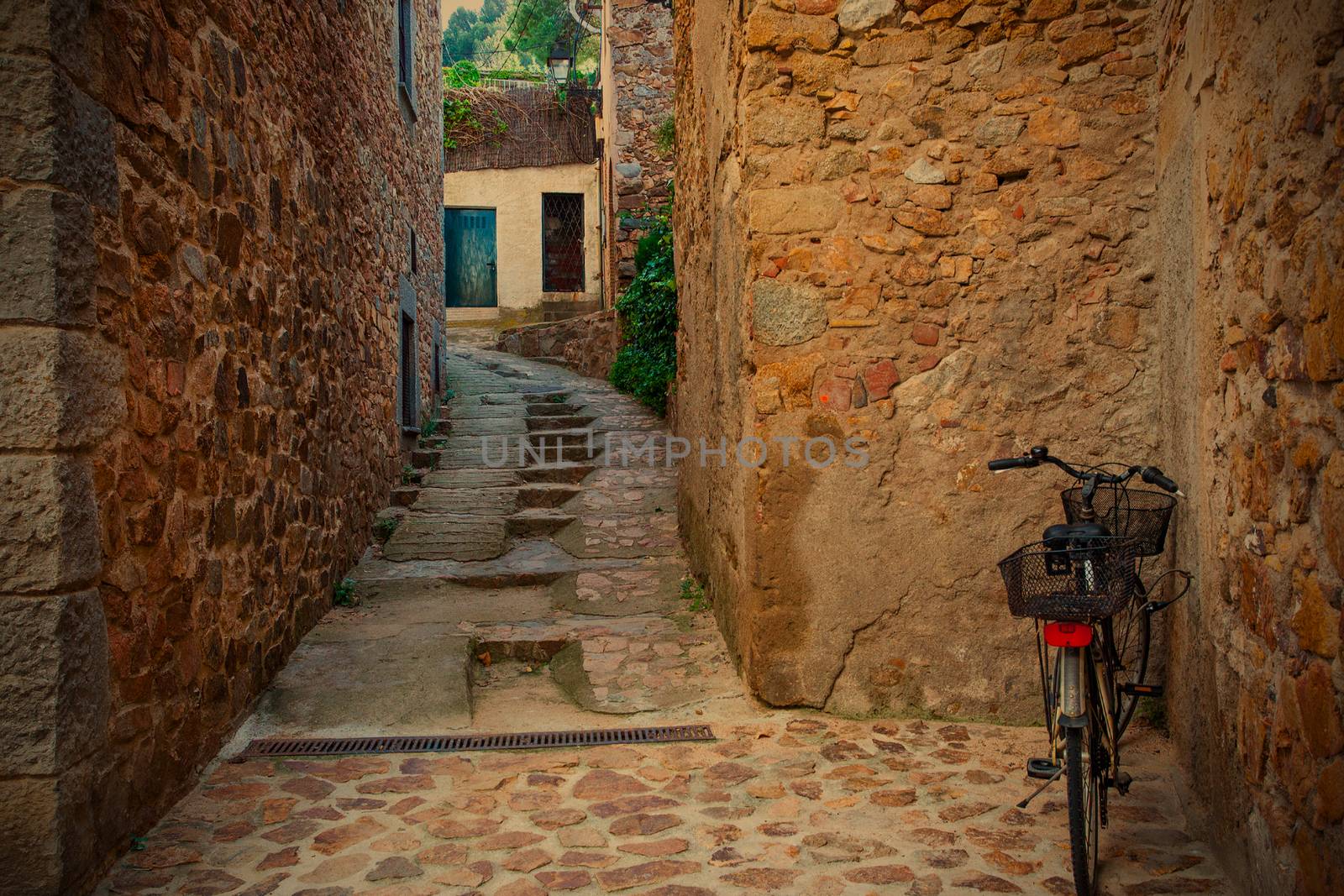 Tossa de Mar, Catalonia, Spain, 06.17.2013, antique street of the town with an old bicycle, instagram image style, editorial use only