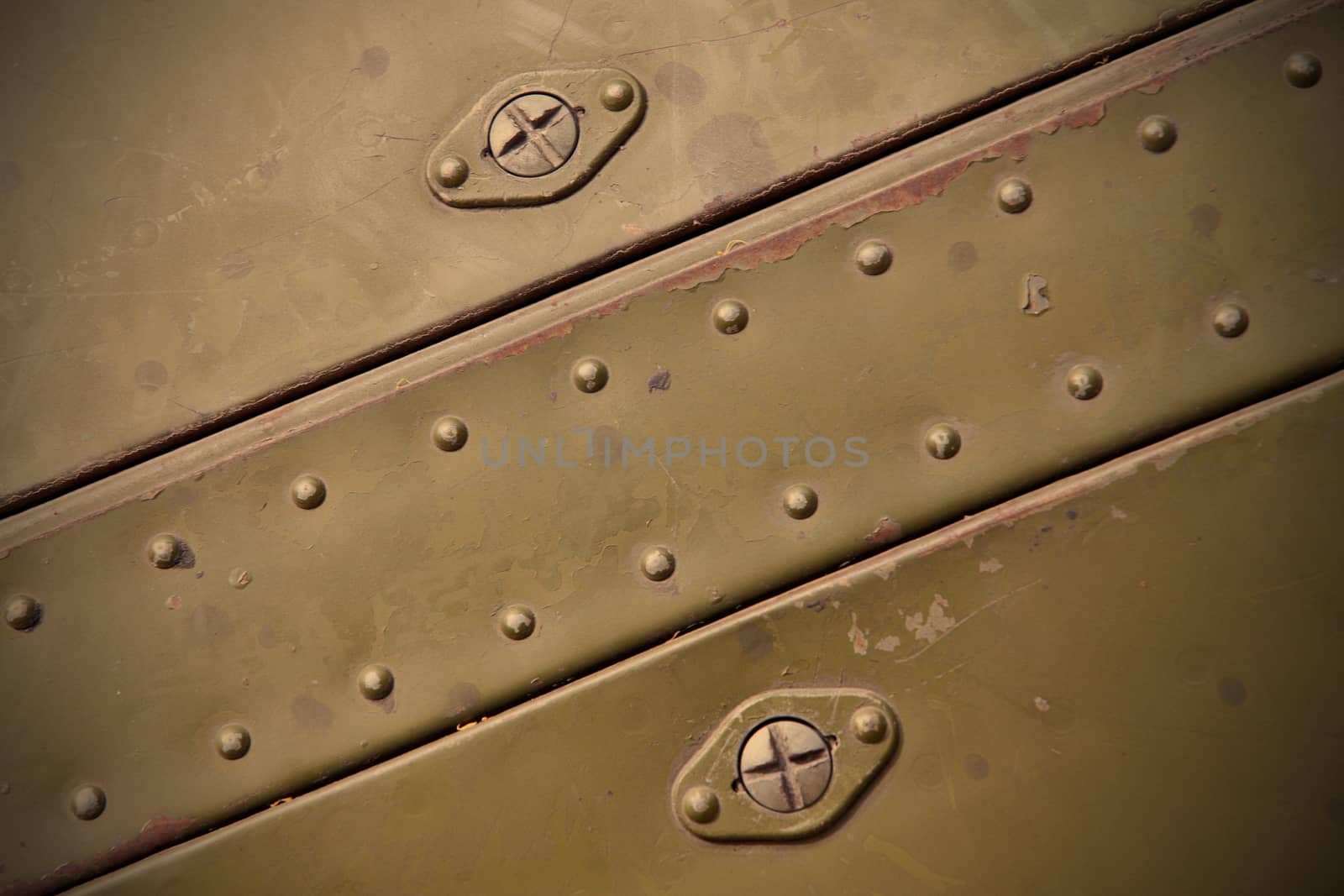 metal surface with rivets by Astroid