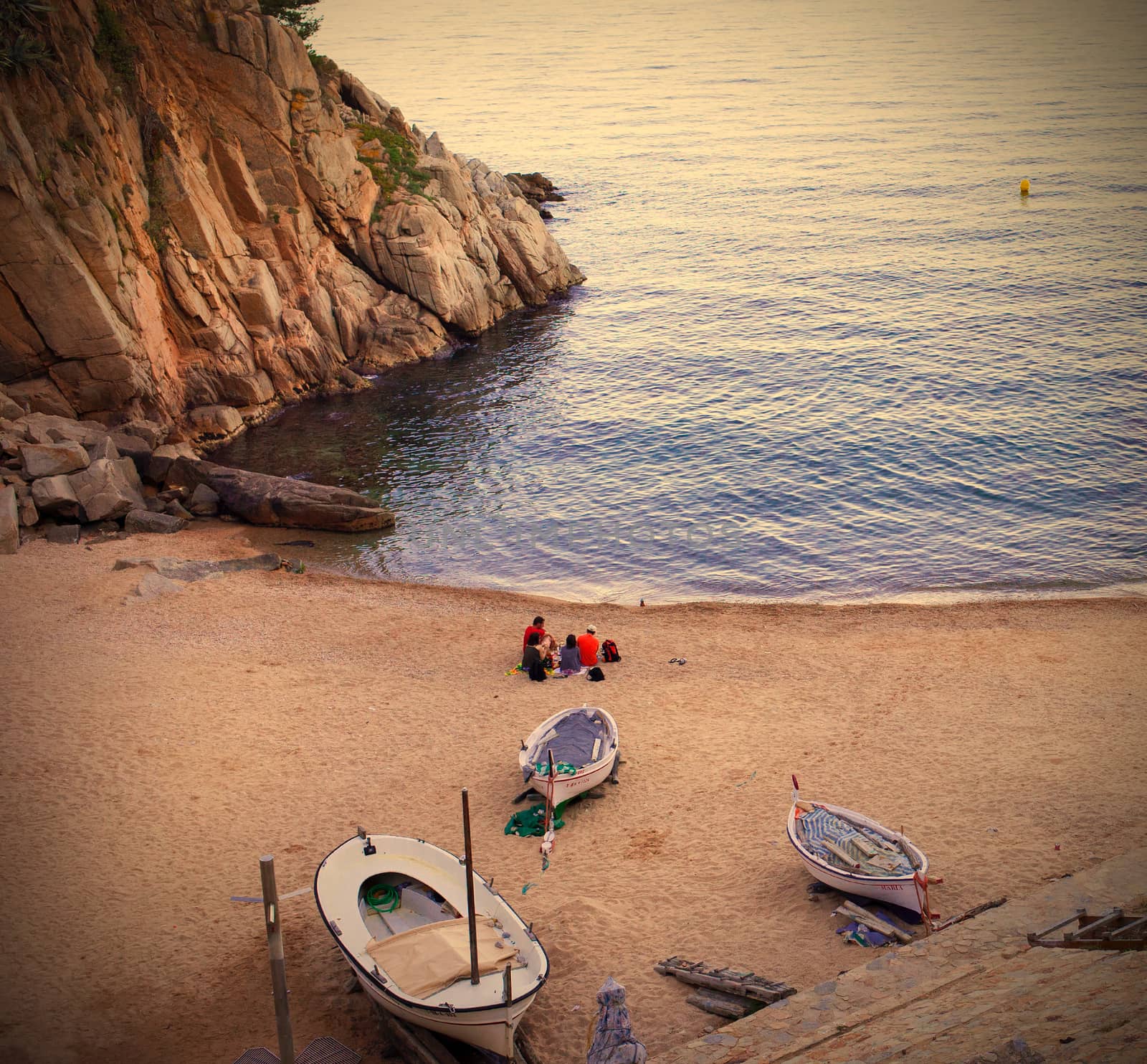 Tossa de Mar, Catalonia, Spain, 2014.06.16, a quiet evening on the beach with white boats, instagram image style