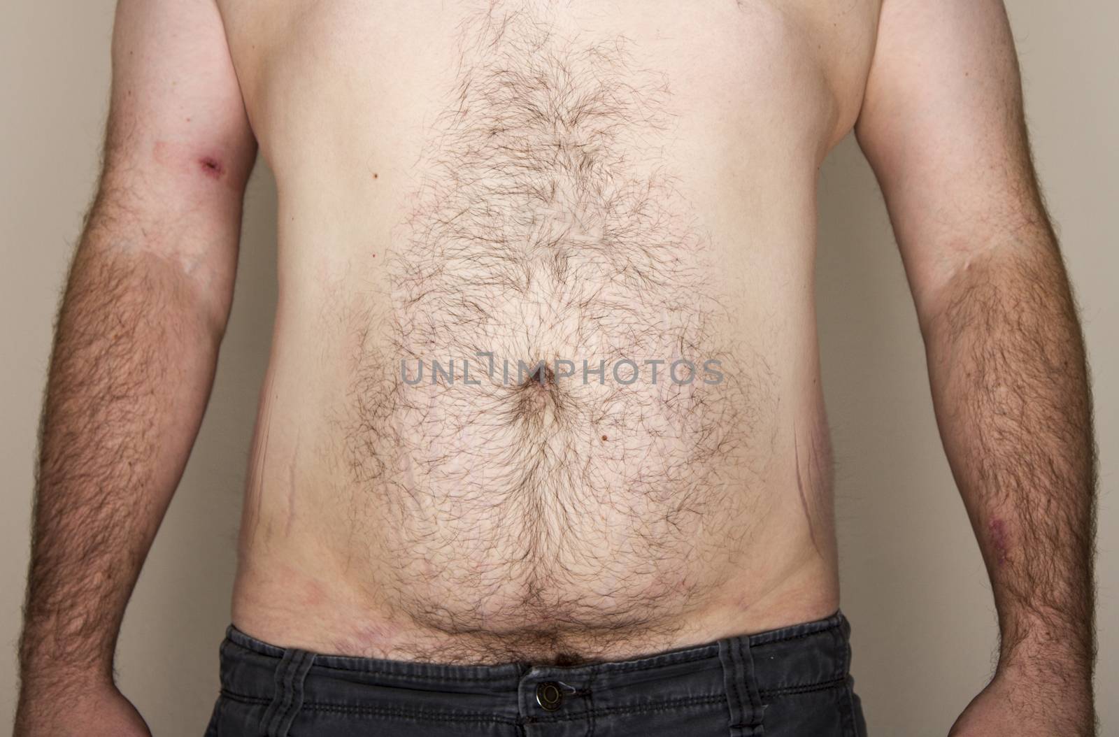 Man of normal weight of not too large but not tiny or muscular facing the camera