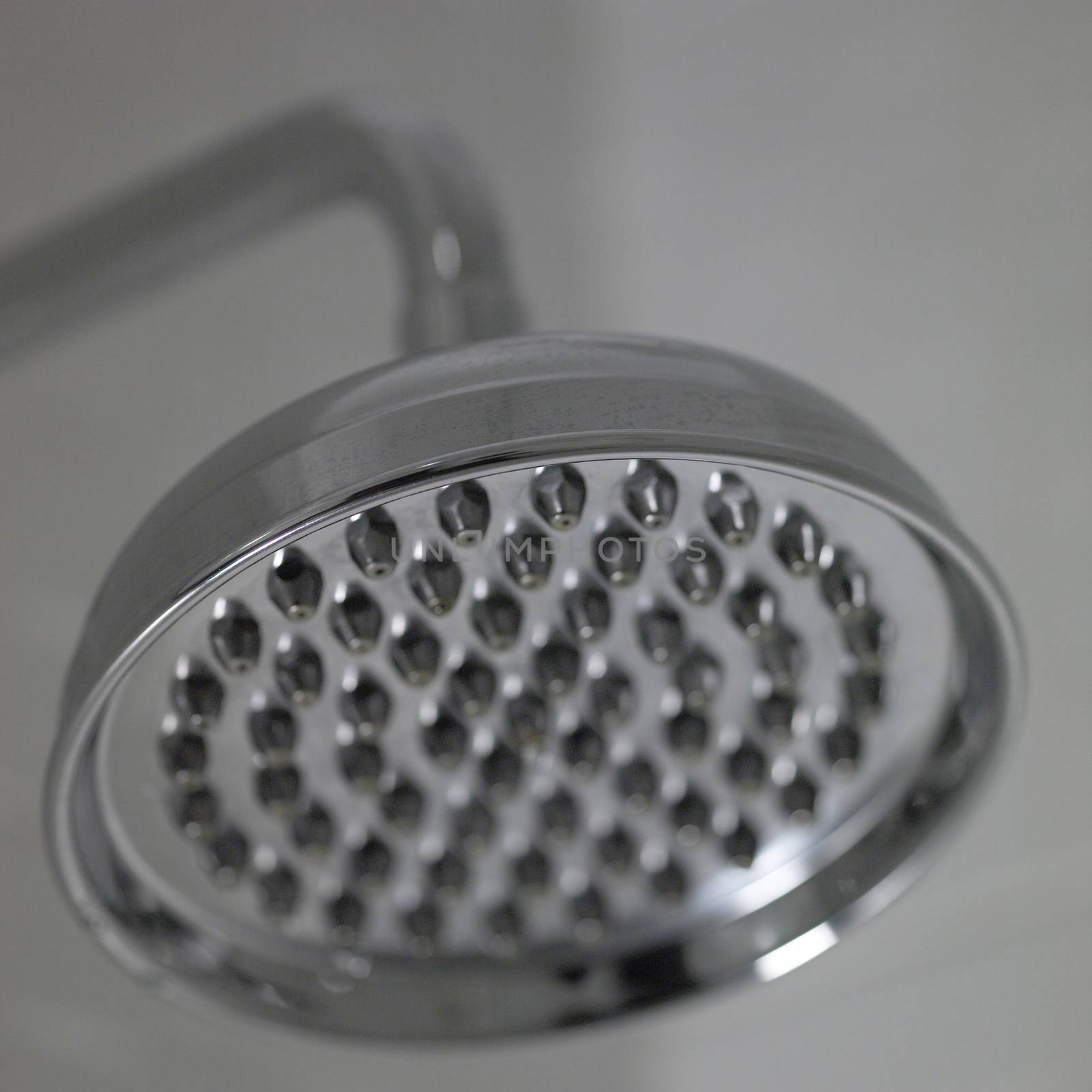 Close up of a silver shower head
