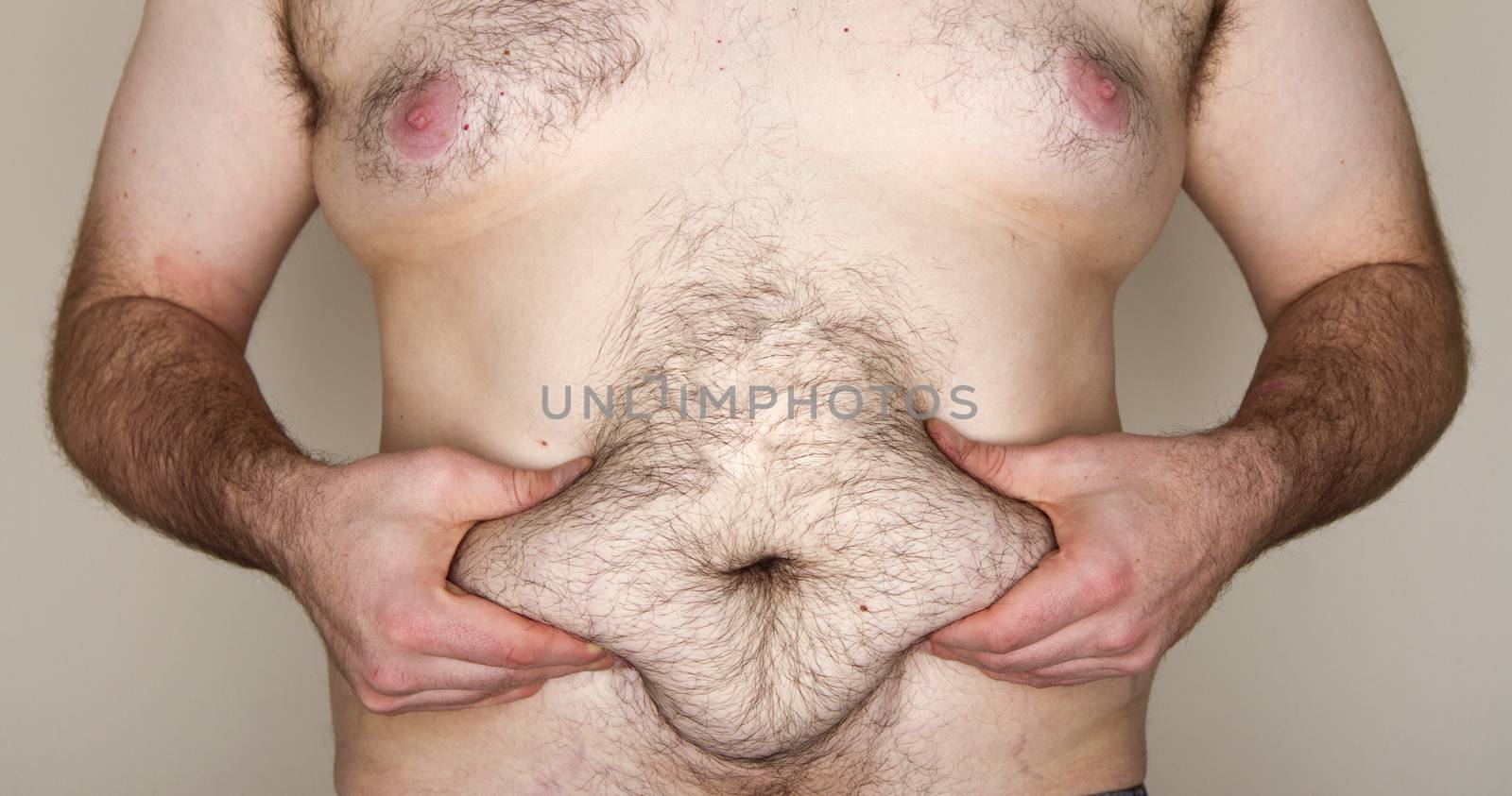 Flab, Fat, Obese, A large man grabs his mid section