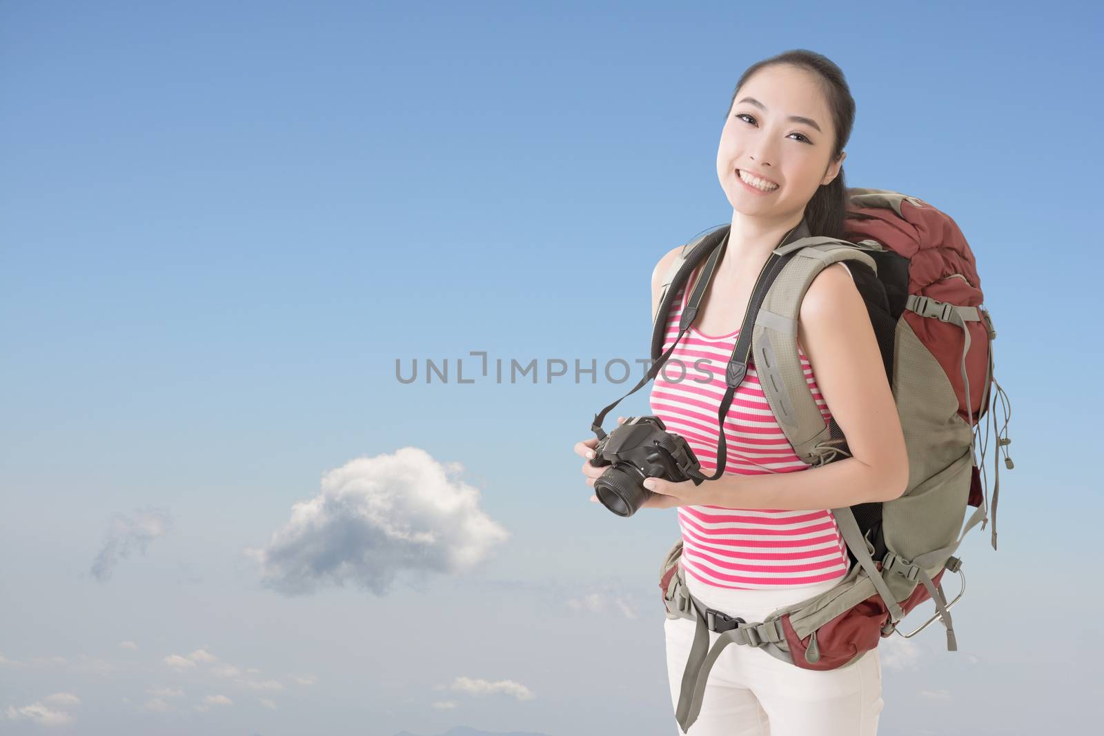 backpacker with camera by elwynn