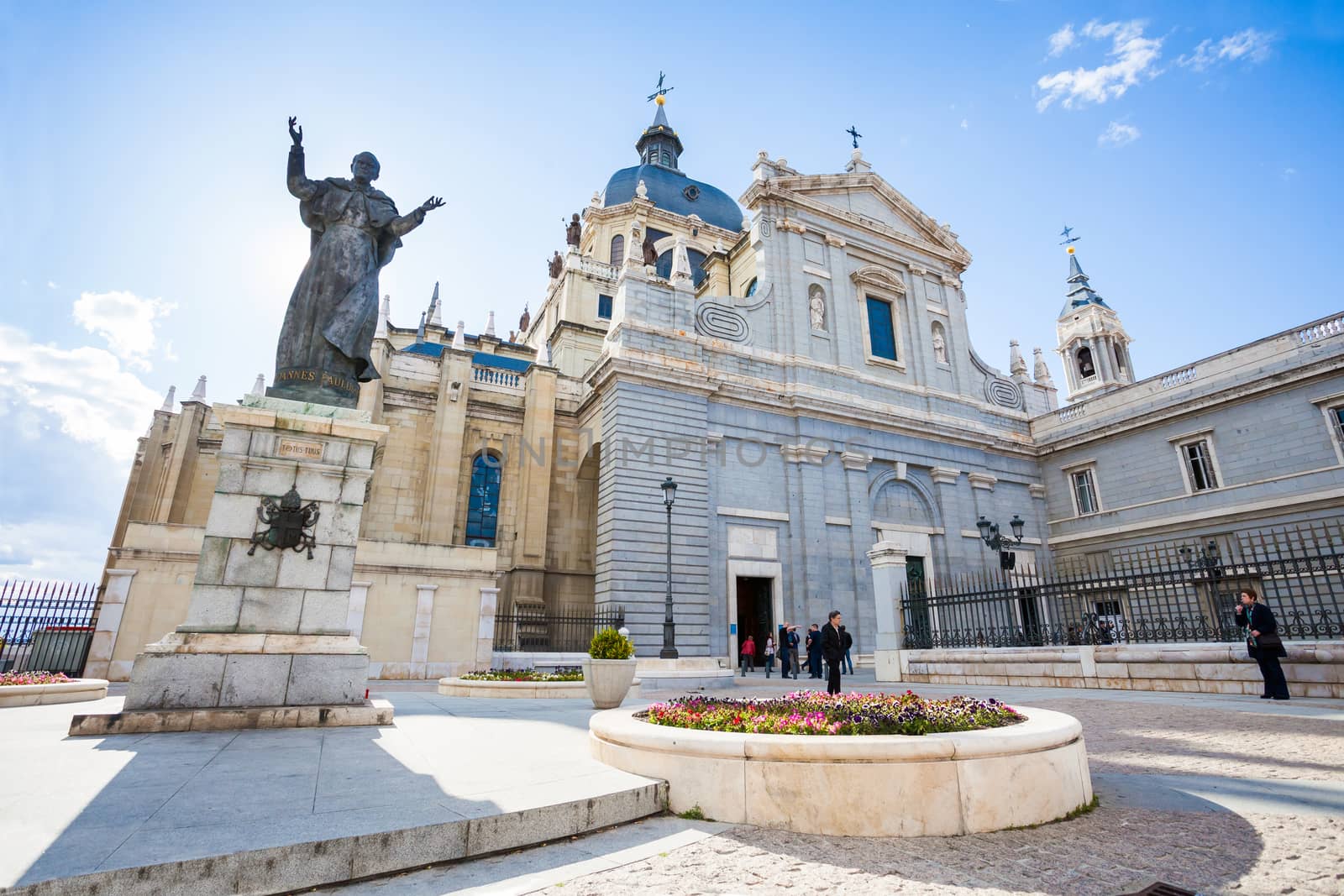 Madrid, Spain - May 6, 2012: Pope John Paul II statue in front of Cathedral Almudena on a spring day in Madrid, Spain