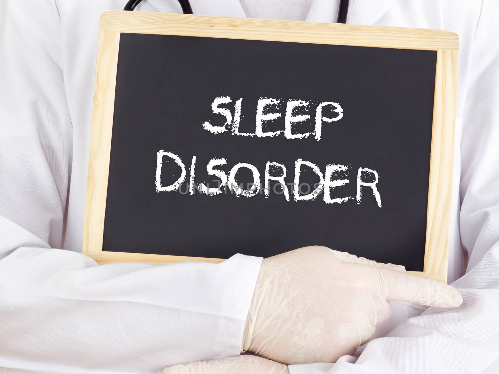 Doctor shows information on blackboard: sleep disorder by gwolters