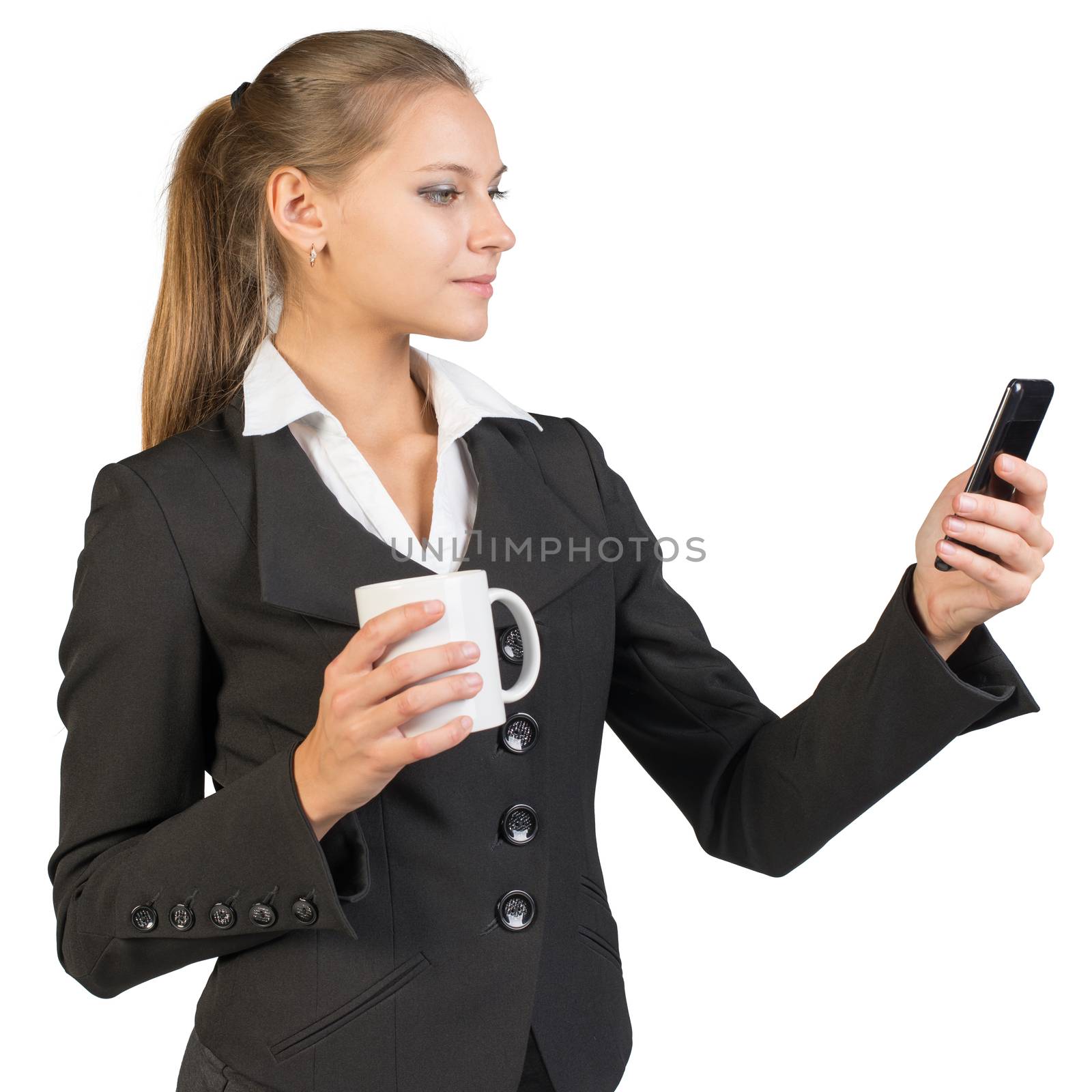 Businesswoman holding mug and using mobile phone. Isolated over white background