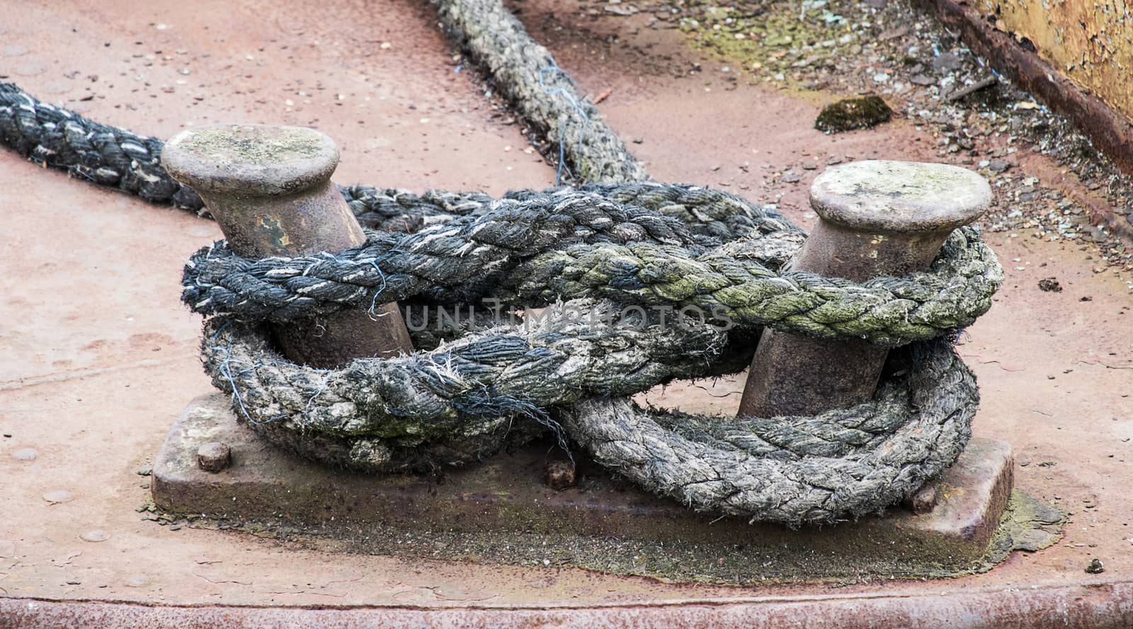 old mooring rope tied to a boat