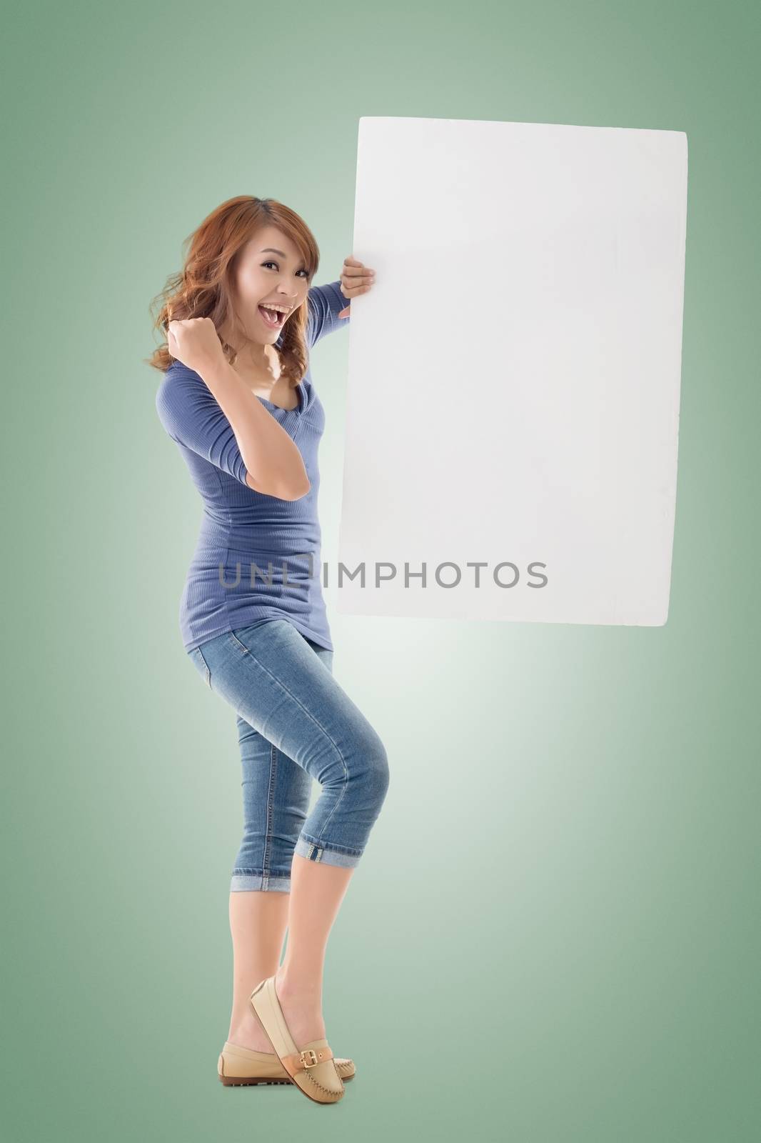 Excited Asian girl hold a blank board by elwynn