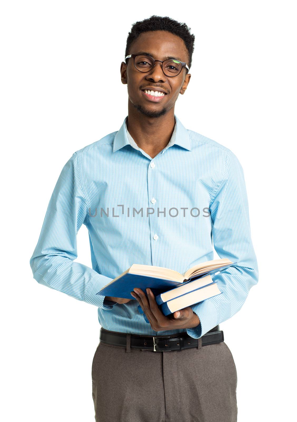 Happy african american college student standing with books in hi by vlad_star