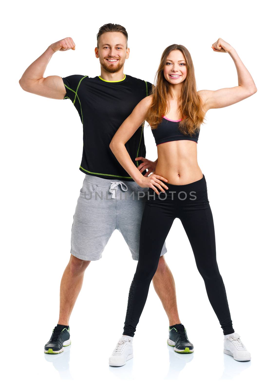 Athletic man and woman after fitness exercise on the white background