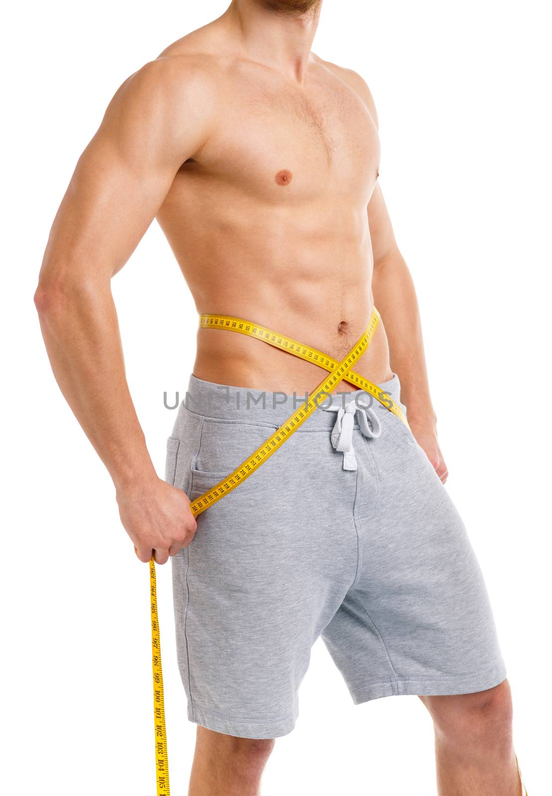 Athletic man with measuring tape on the white by vlad_star