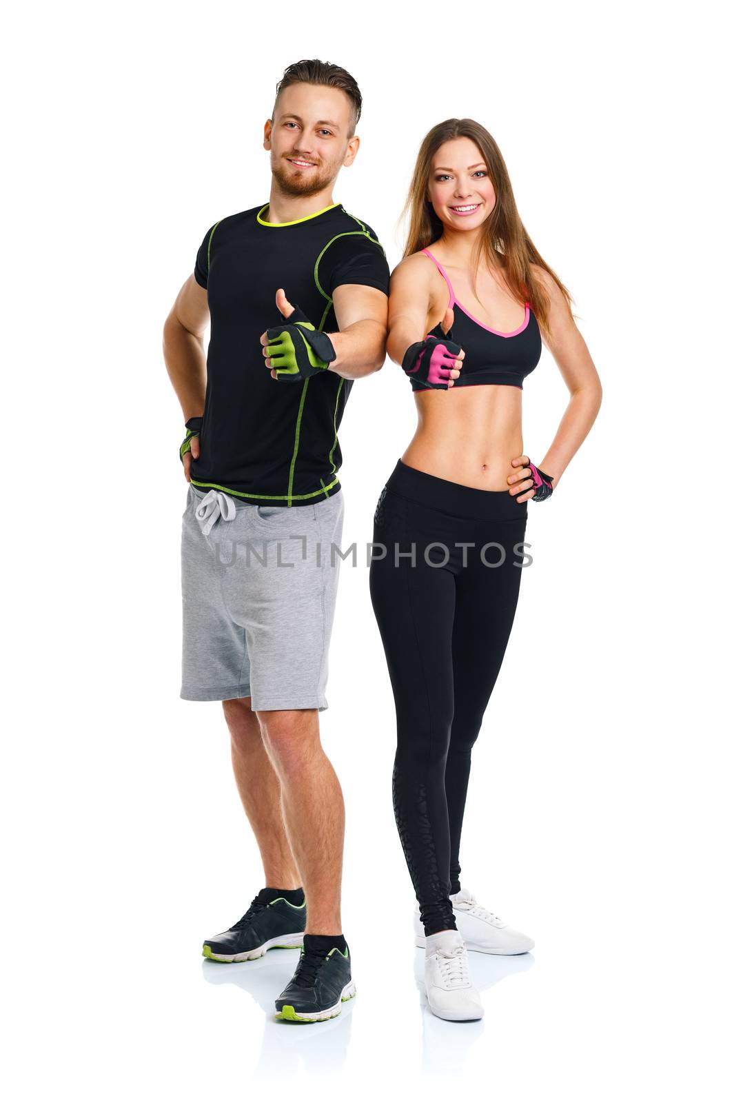 Athletic man and woman after fitness exercise with a finger up on the white background