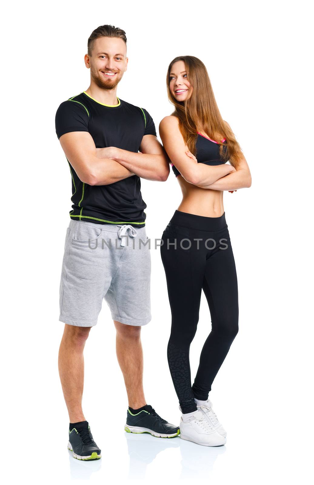 Athletic man and woman after fitness exercise on the white background