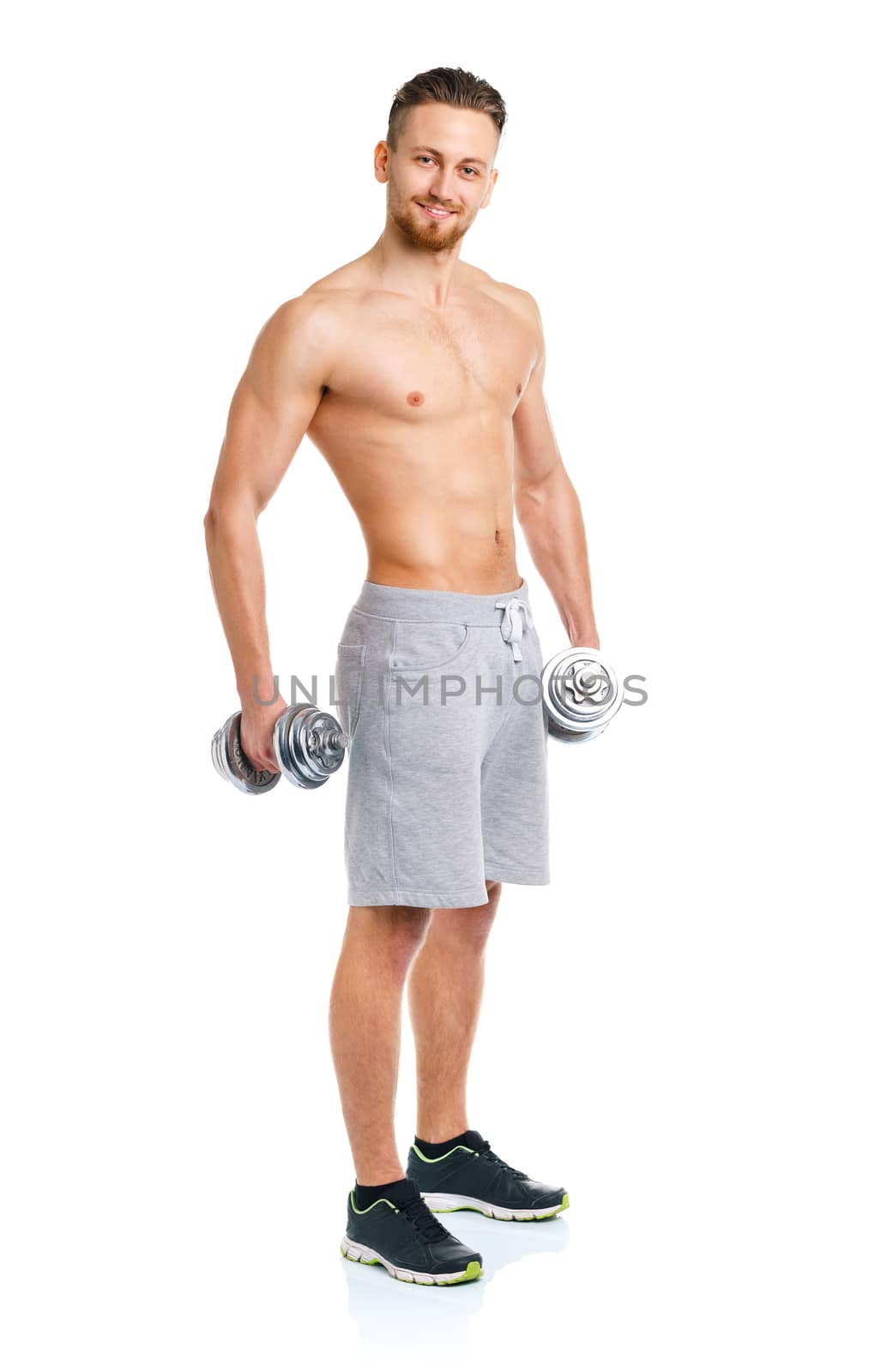 Athletic man with dumbbells on the white background