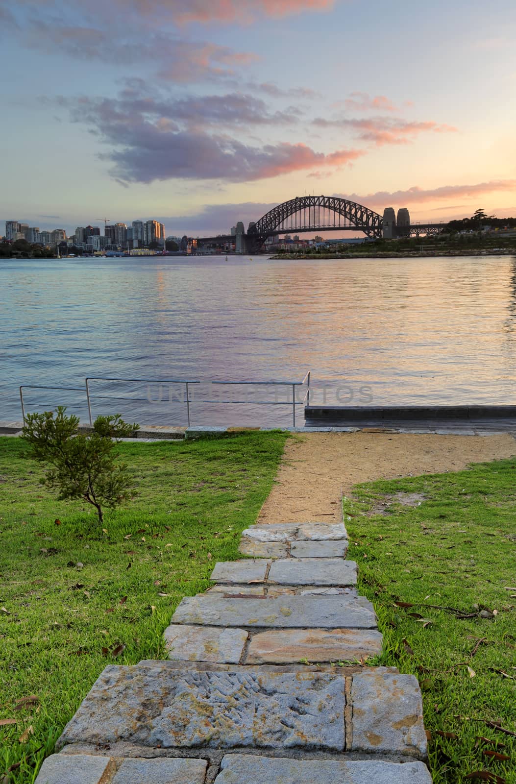 Sunrise behind Sydney Harbour Bridge from Balmain by lovleah