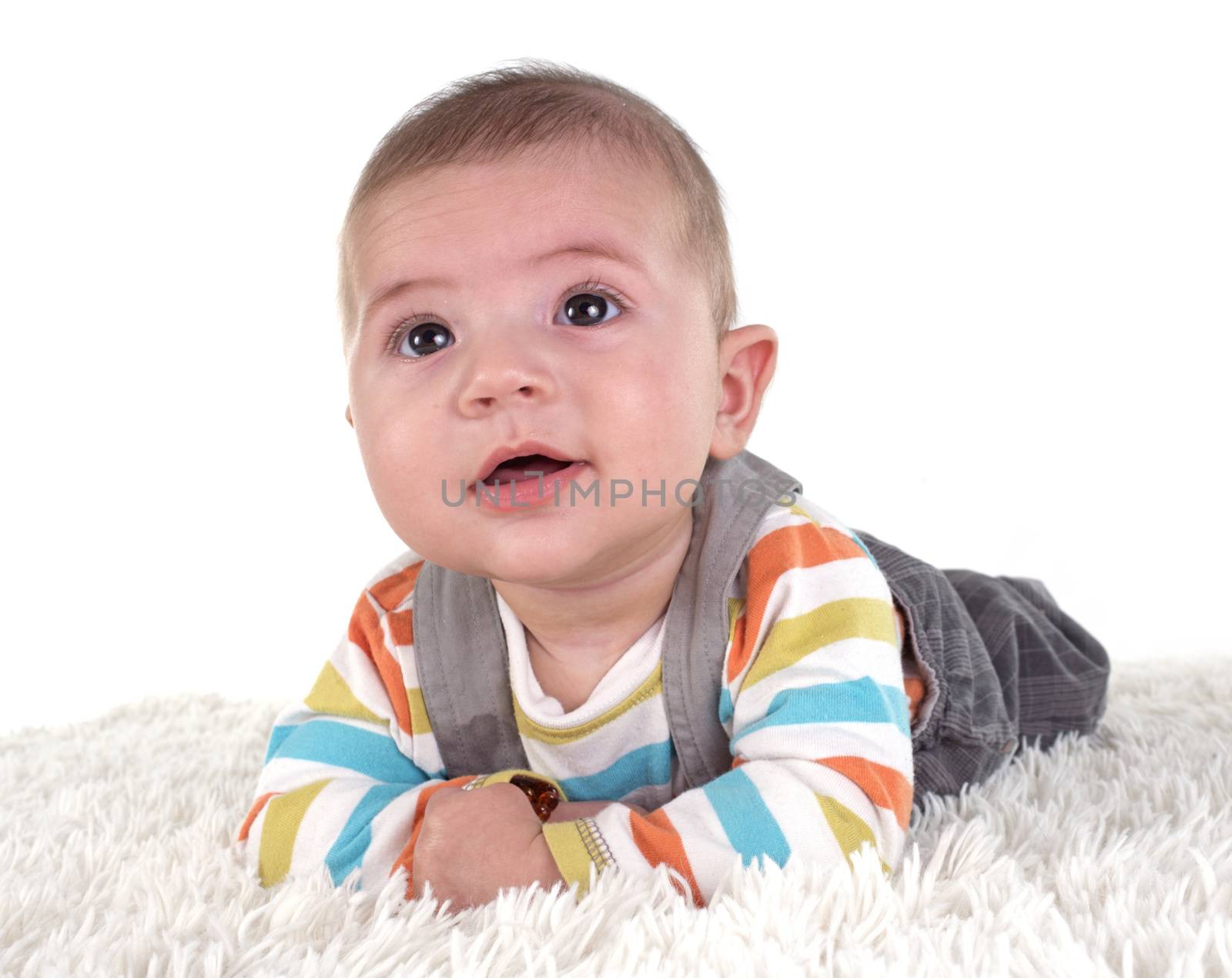 three months baby in front of white background
