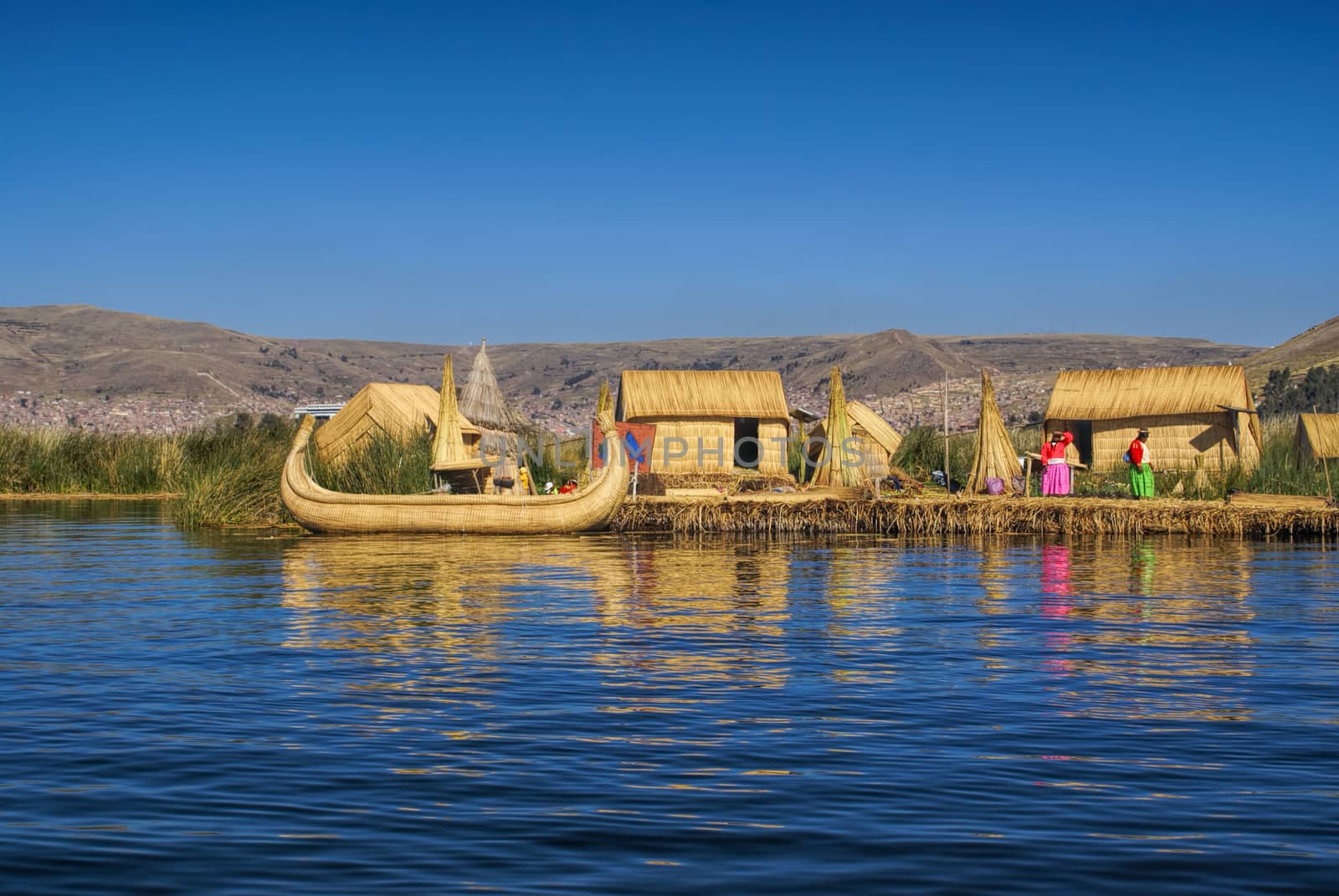 Traditional village on floating islands on lake Titicaca in Peru, South America    