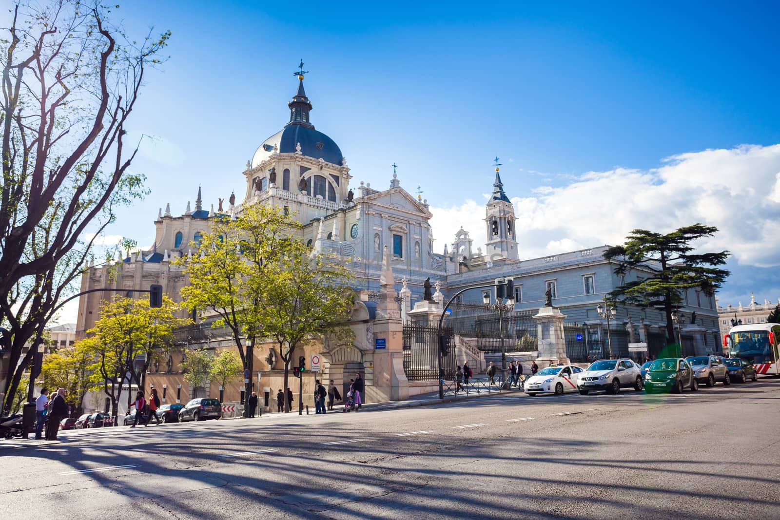 Madrid, Spain - May 6, 2012: Cathedral Almudena with tourists on a spring day in Madrid, Spain