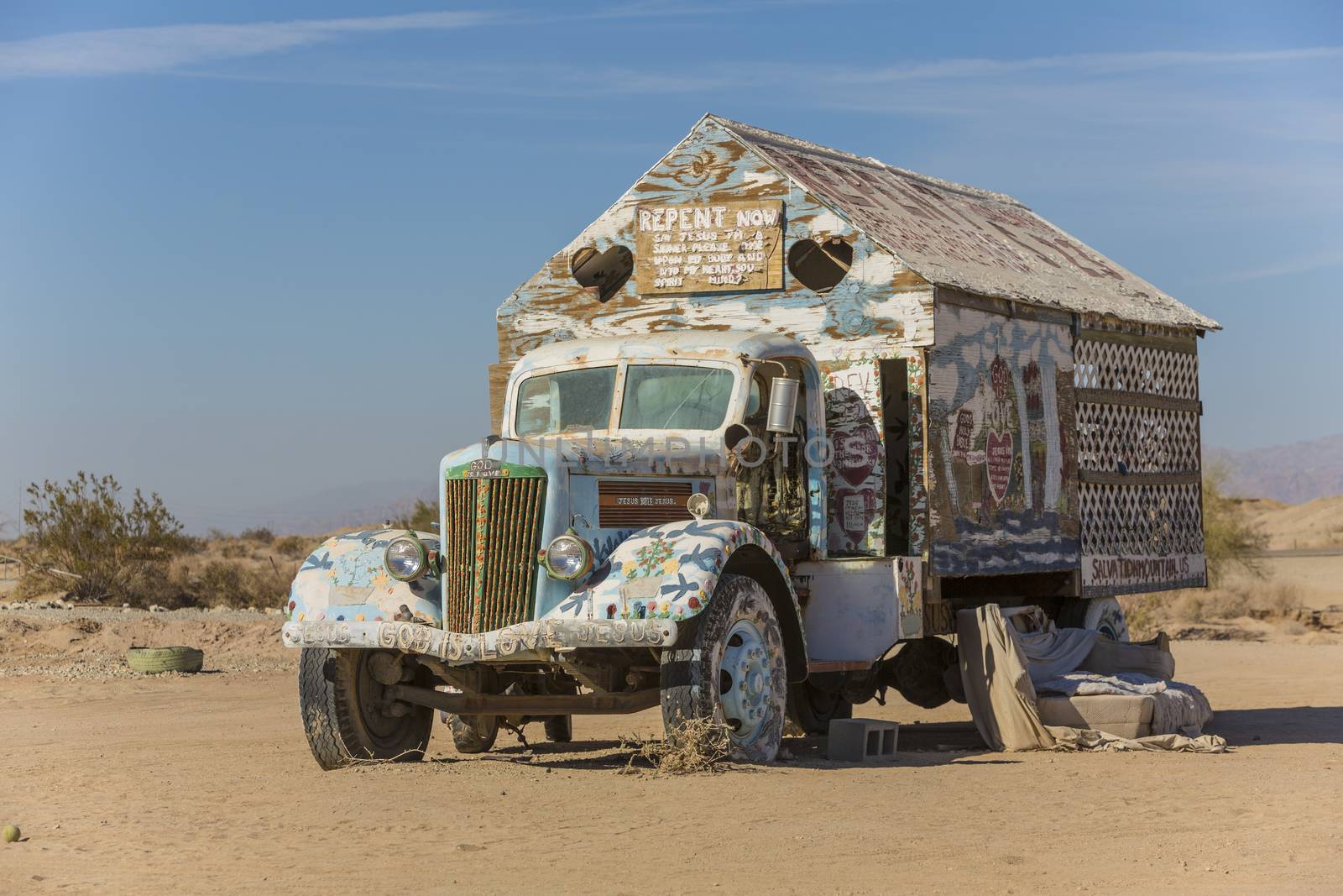 CALIPATRIA, IMPERIAL COUNTY, CALIFORNIA, USA - NOVEMBER 28: Bible truck outsider art installation at Salvation Mountain on November 28, 2014 in at Calipatria, California, USA.