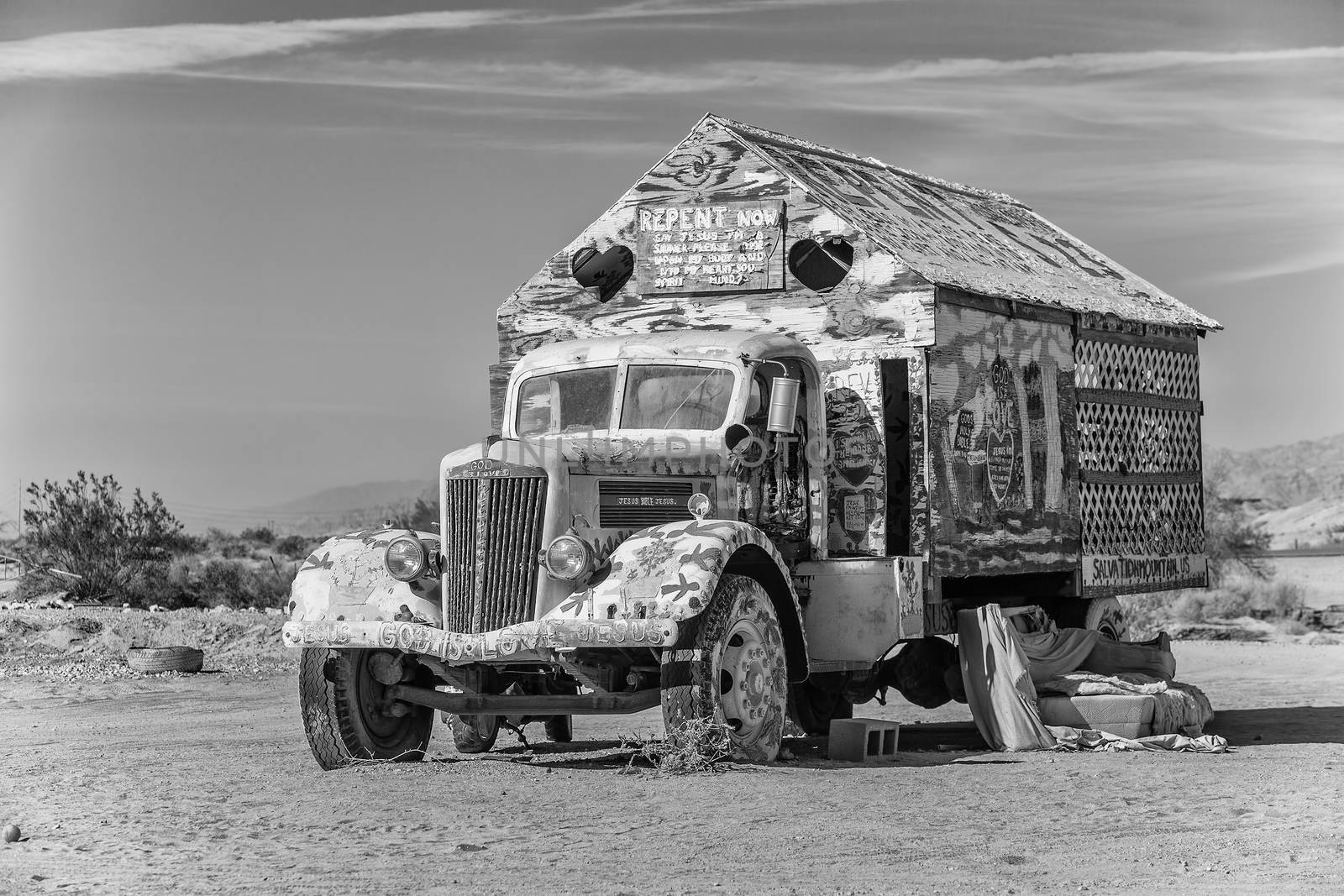 CALIPATRIA, IMPERIAL COUNTY, CALIFORNIA, USA - NOVEMBER 28: Black and white rendering of Bible truck outsider art installation at Salvation Mountain on November 28, 2014 in at Calipatria, California, USA.