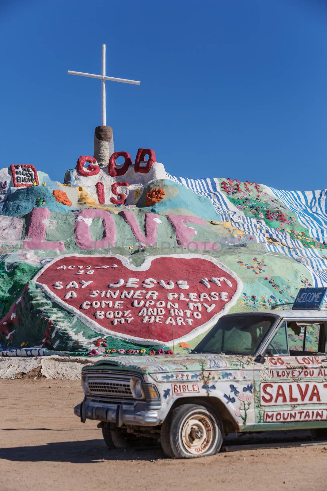 CALIPATRIA, IMPERIAL COUNTY, CALIFORNIA, USA - NOVEMBER 28: Bible car and outsider art installation Salvation Mountain on November 28, 2014 in at Calipatria, California, USA.