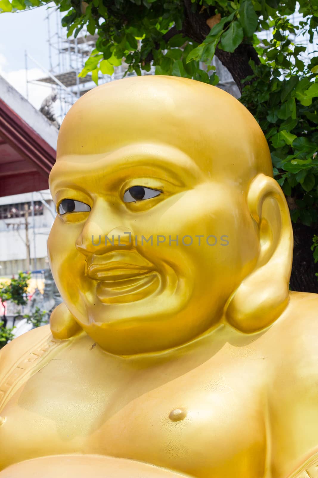 Smiling Golden Buddha Statue - chinese God of Happiness, Wat Arun, Bangkok