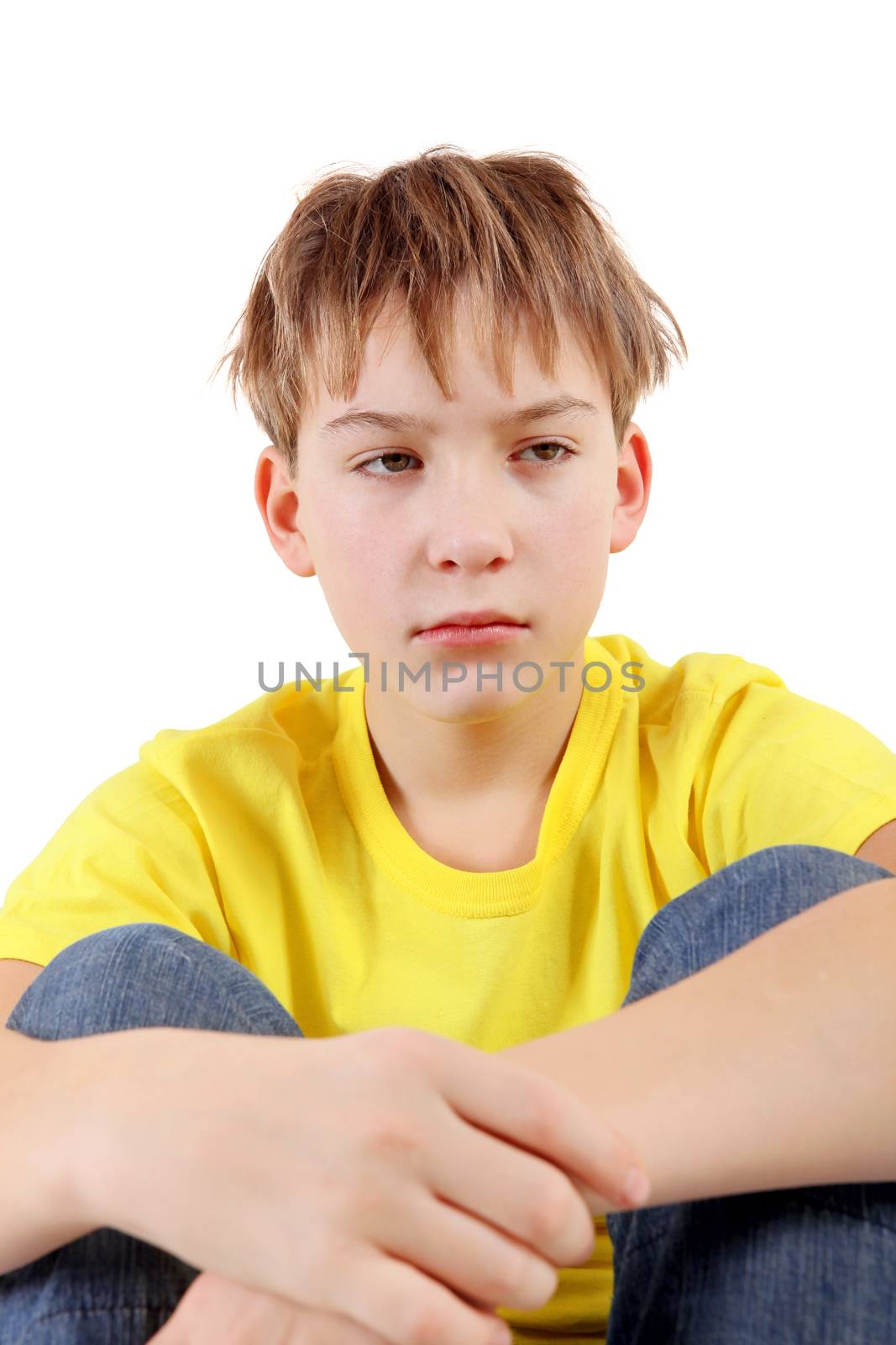 Sad and Tired Teenager Isolated on the White Background