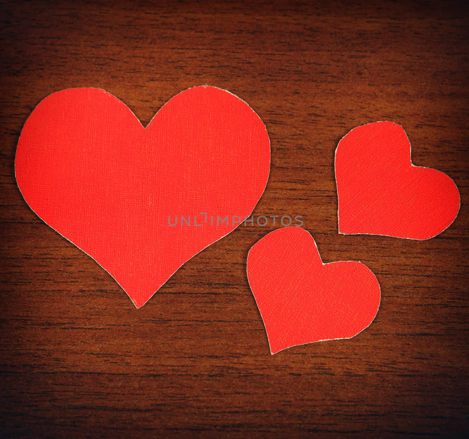 Heart Shapes on the Wooden Background by sabphoto