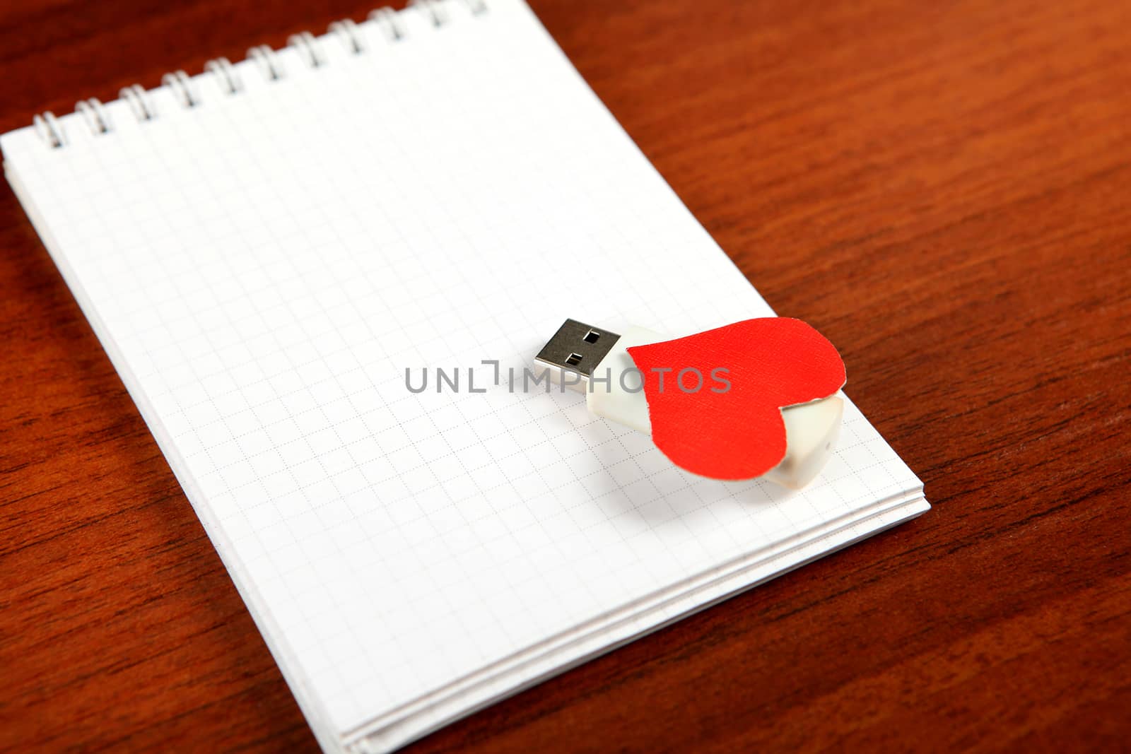 USB Flash Drives with Heart Shape on the Blank Note Pad