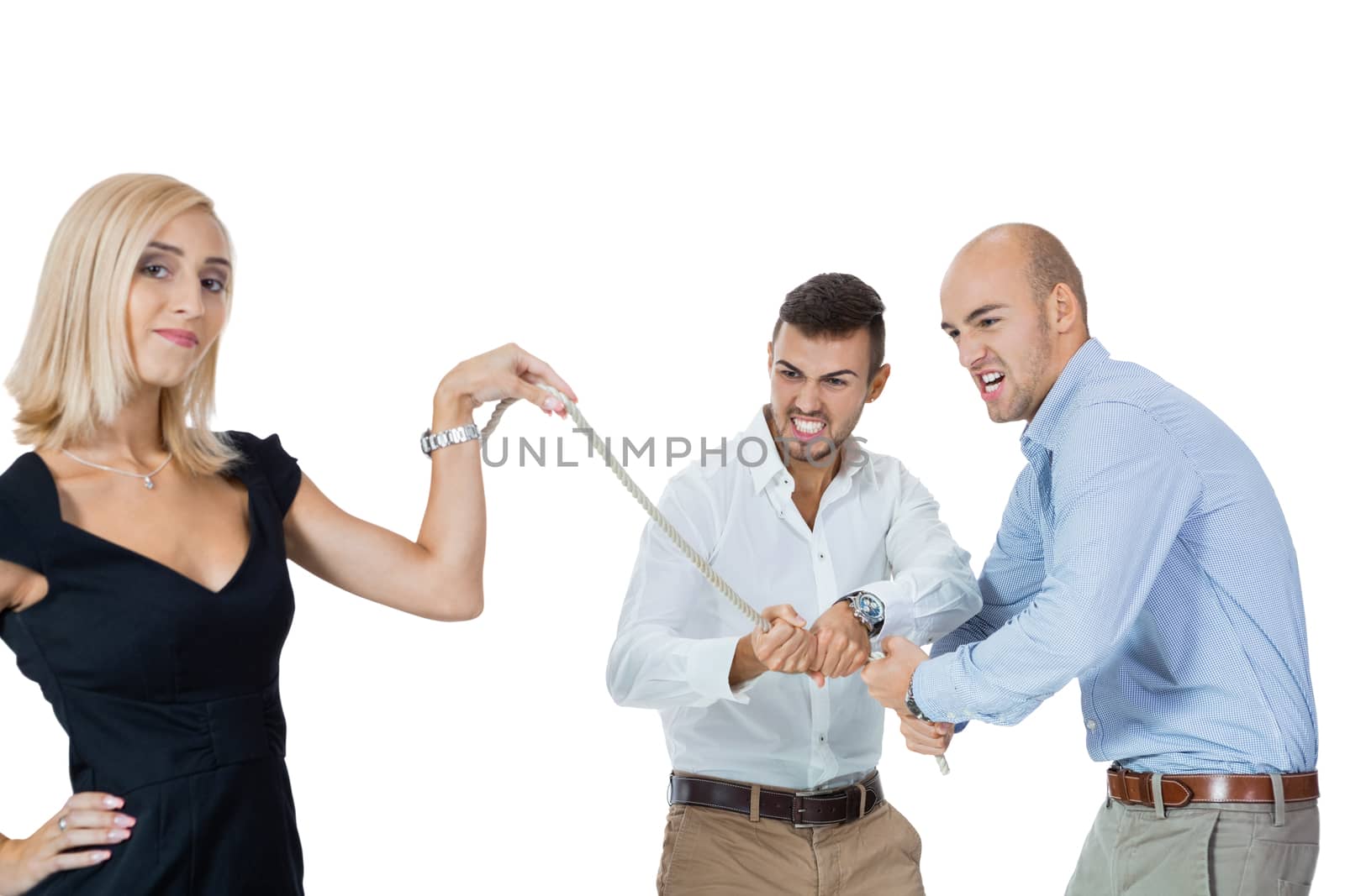 Beautiful strong fit woman demonstrating her dominance in a tug of war with two men pulling as hard as they can on the end of a rope she is holding while she remains nonchalant and glamorous, on white