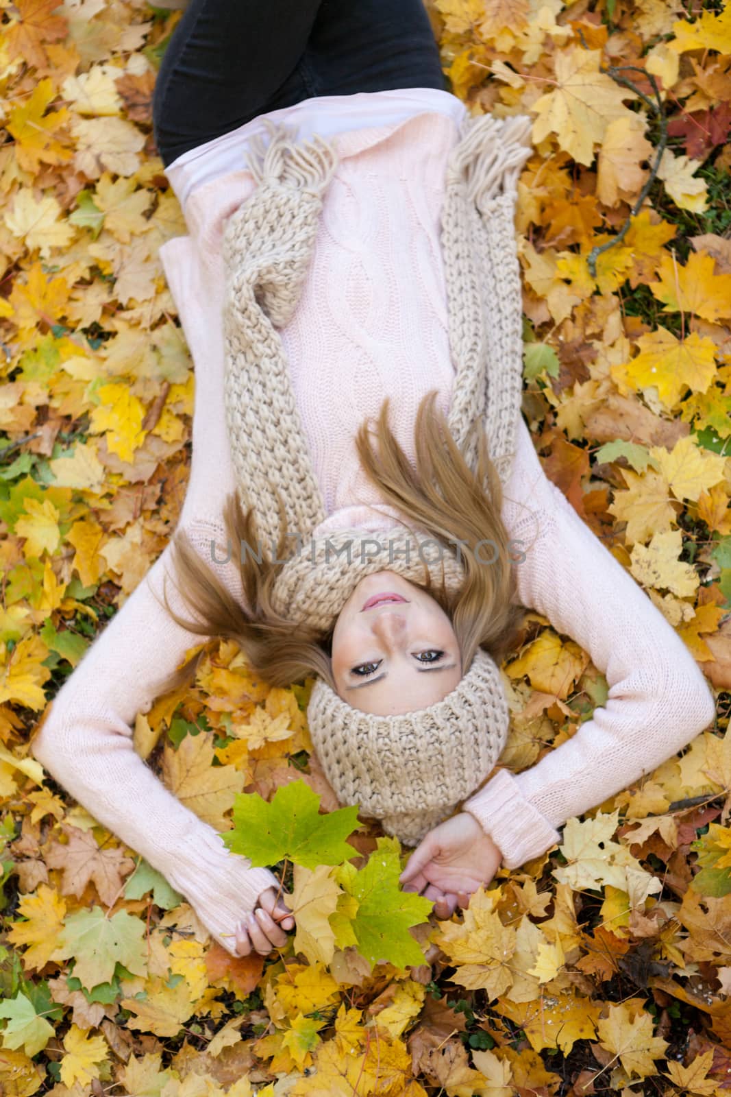 attractive young woman relaxing in atumn park outdoor nature yellow