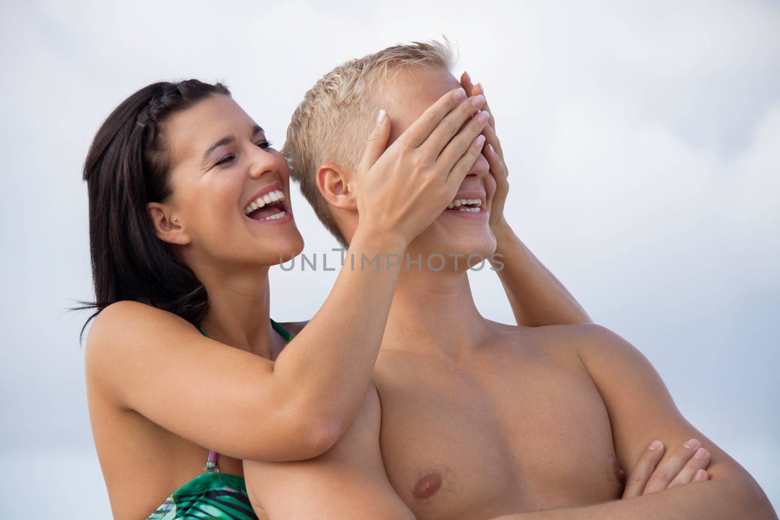 smiling young couple having fun in summer holiday by juniart