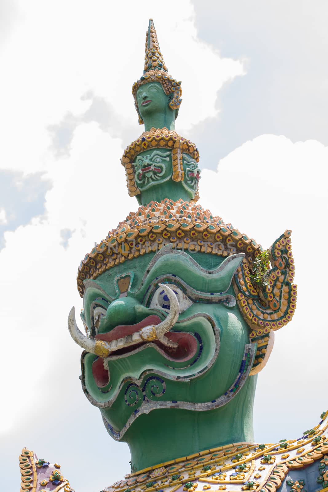 Measure giant in Arun temple of Bangkok, Thailand, face closeup