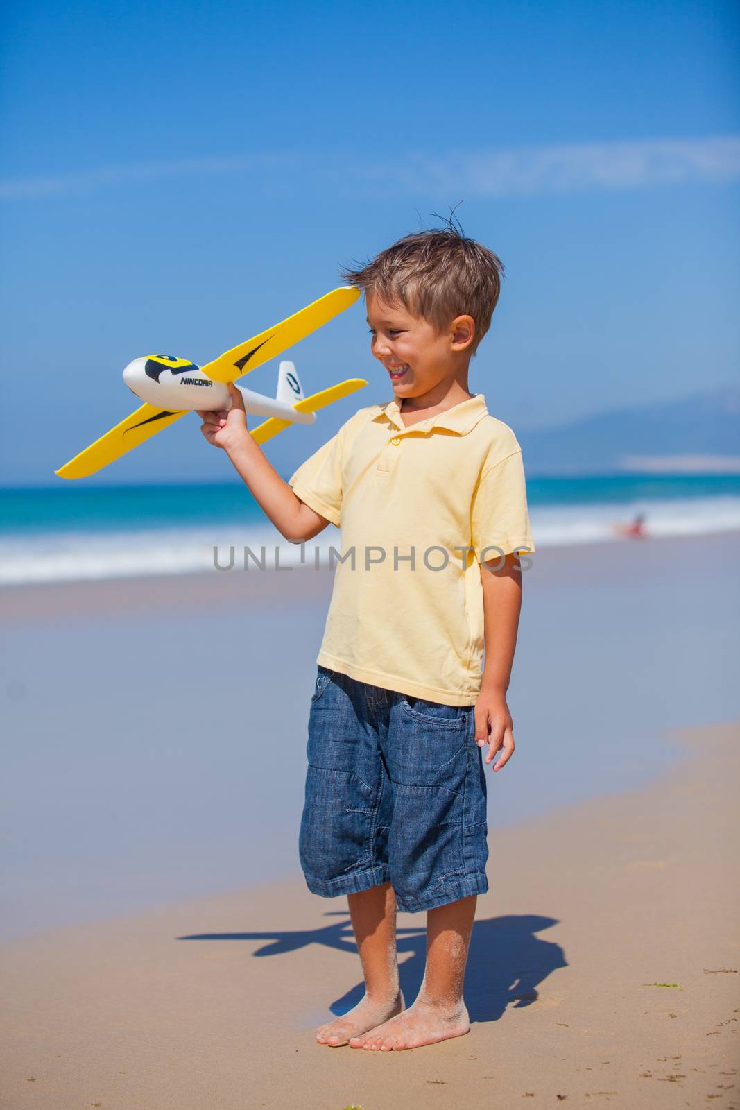 Boy with kite  by maxoliki