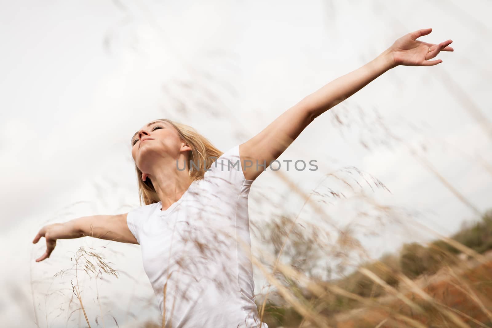 young happy attractive woman arms wide open  by juniart