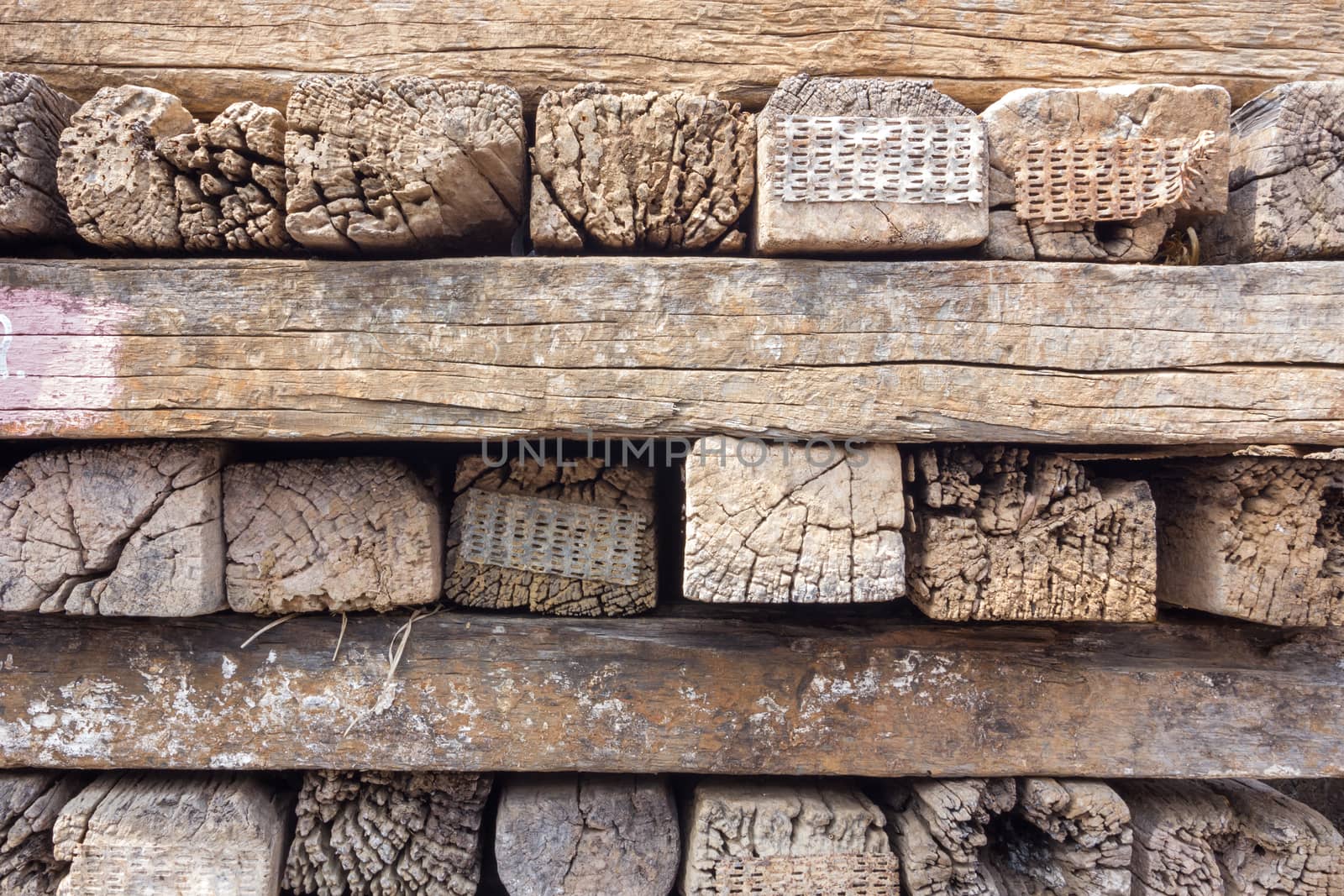 old stack of railroad ties in thailand.