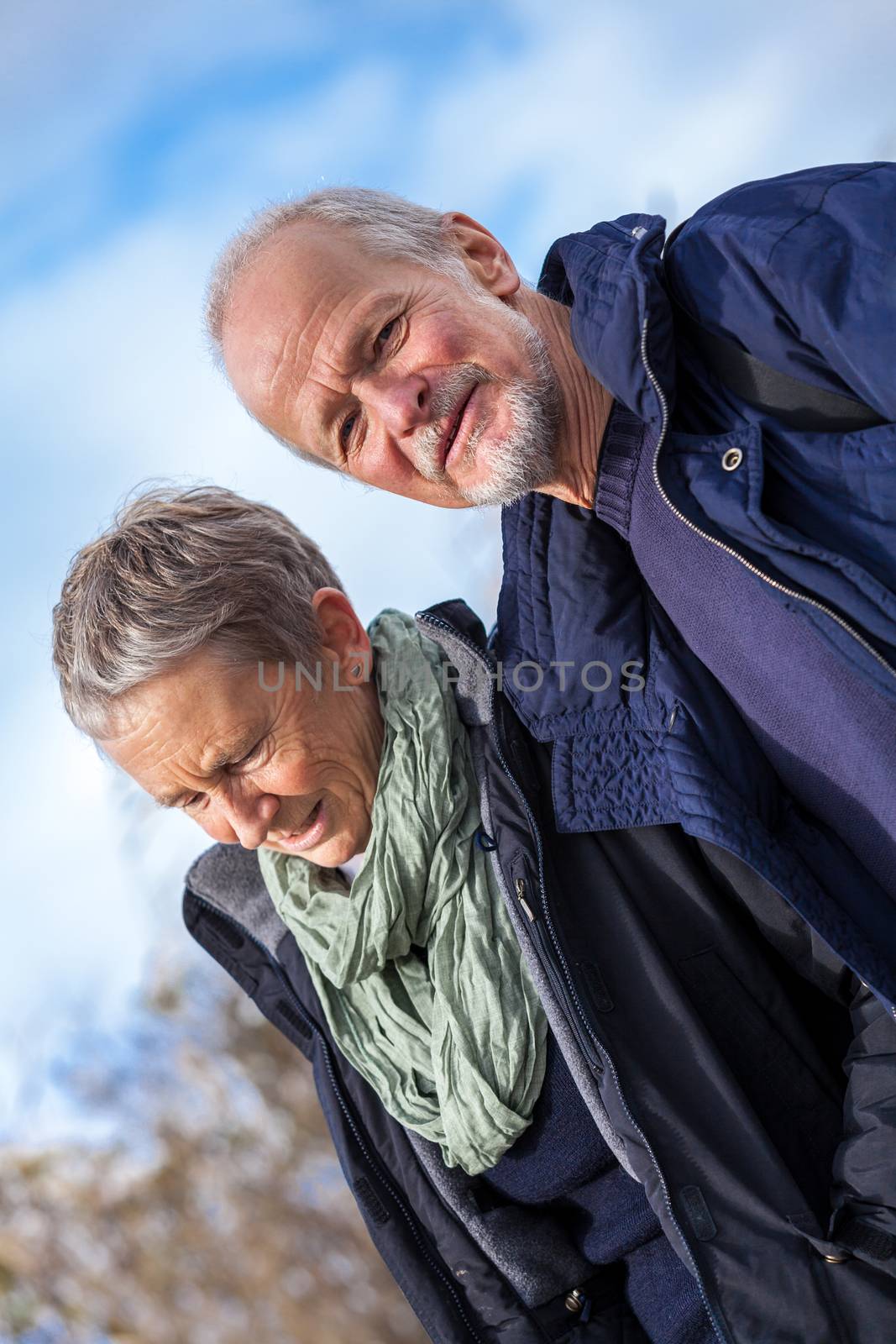 happy senior couple elderly people together outdoor in autumn winter