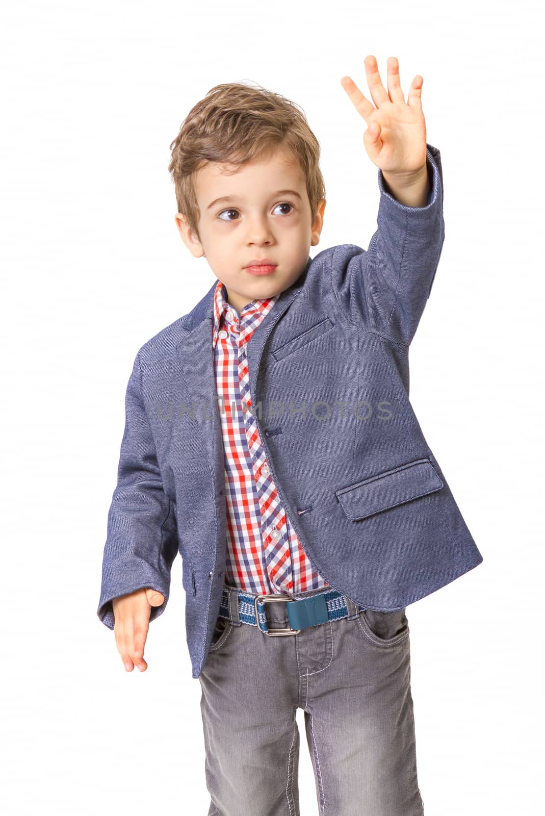 little boy with jacket and with his hand lifted up on white background