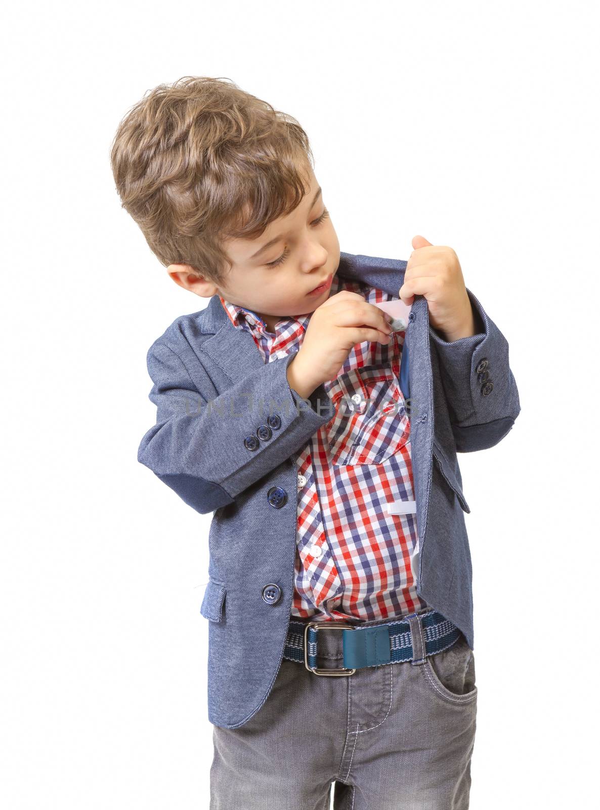 little boy puts money in his pocket by manaemedia