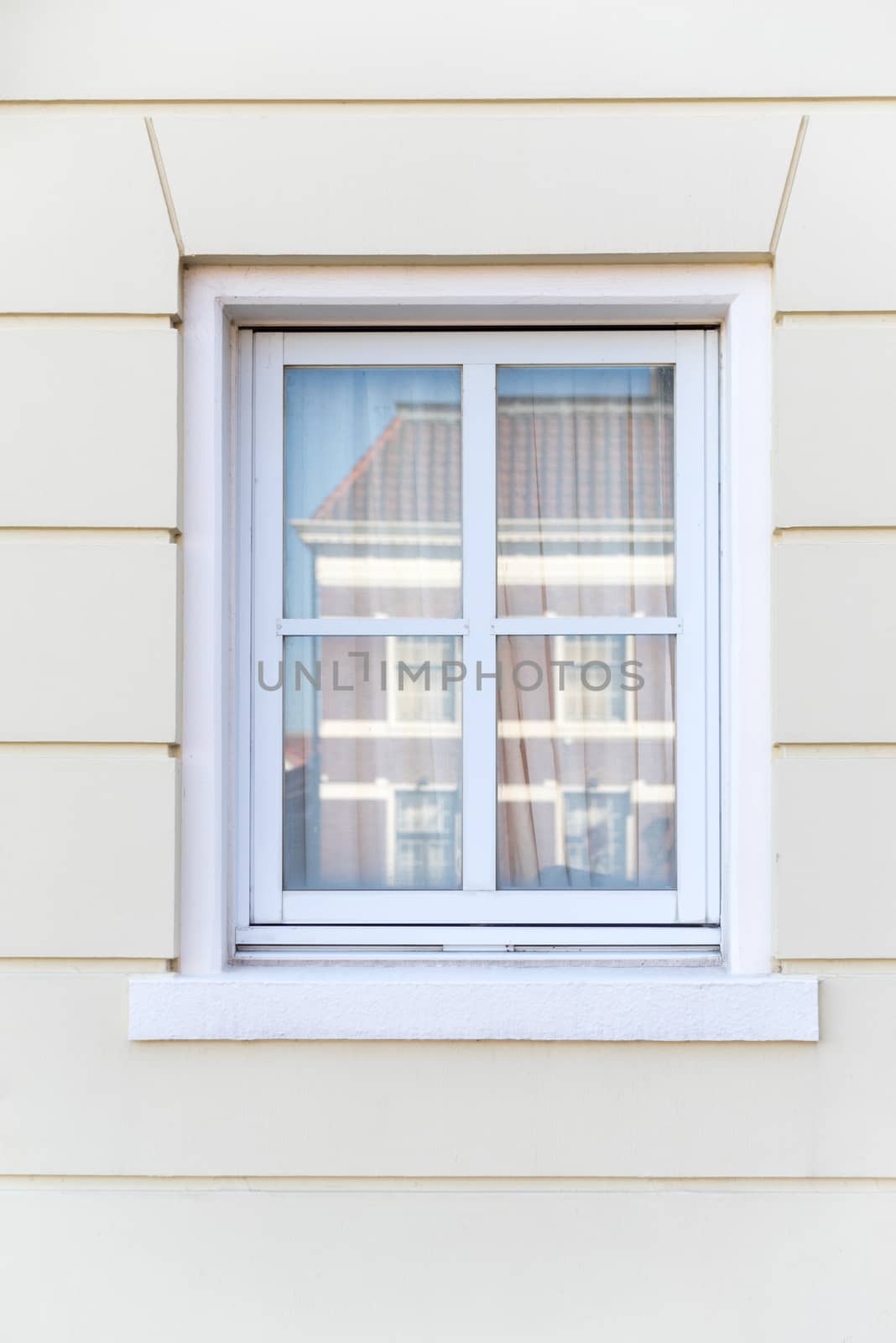 White color vintage style window with cream color wall