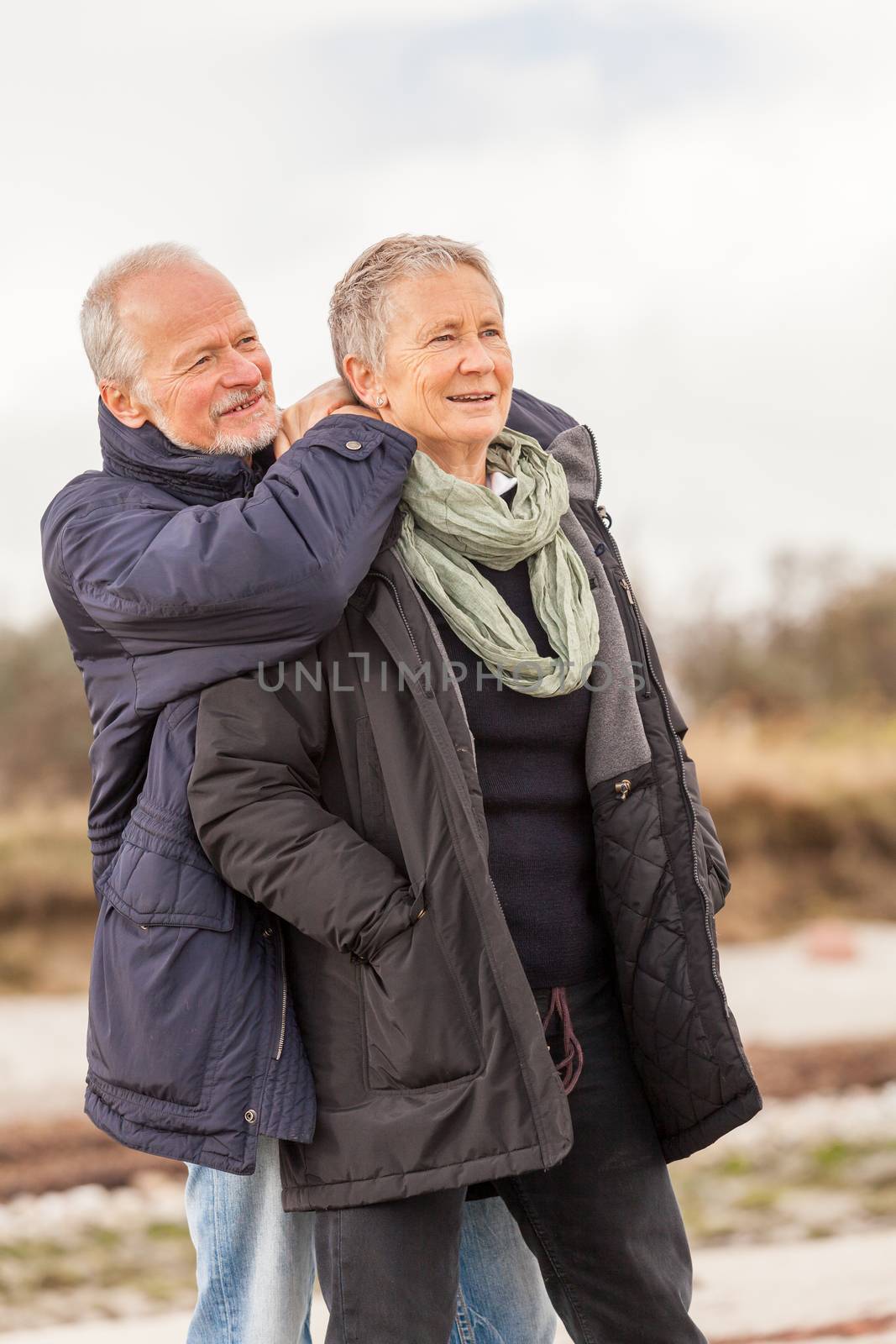 happy senior couple elderly people together outdoor by juniart