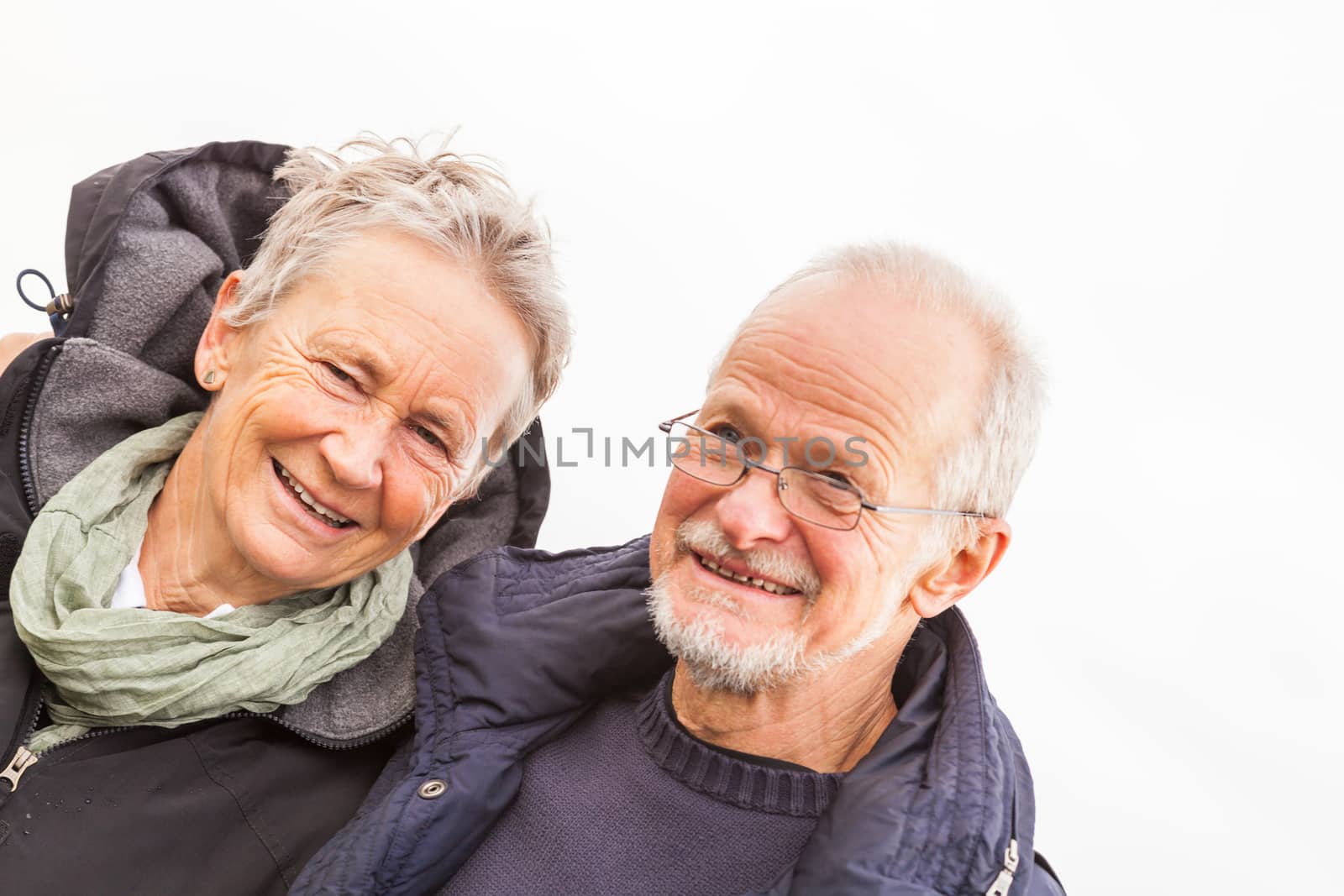 happy mature couple relaxing baltic sea dunes  by juniart